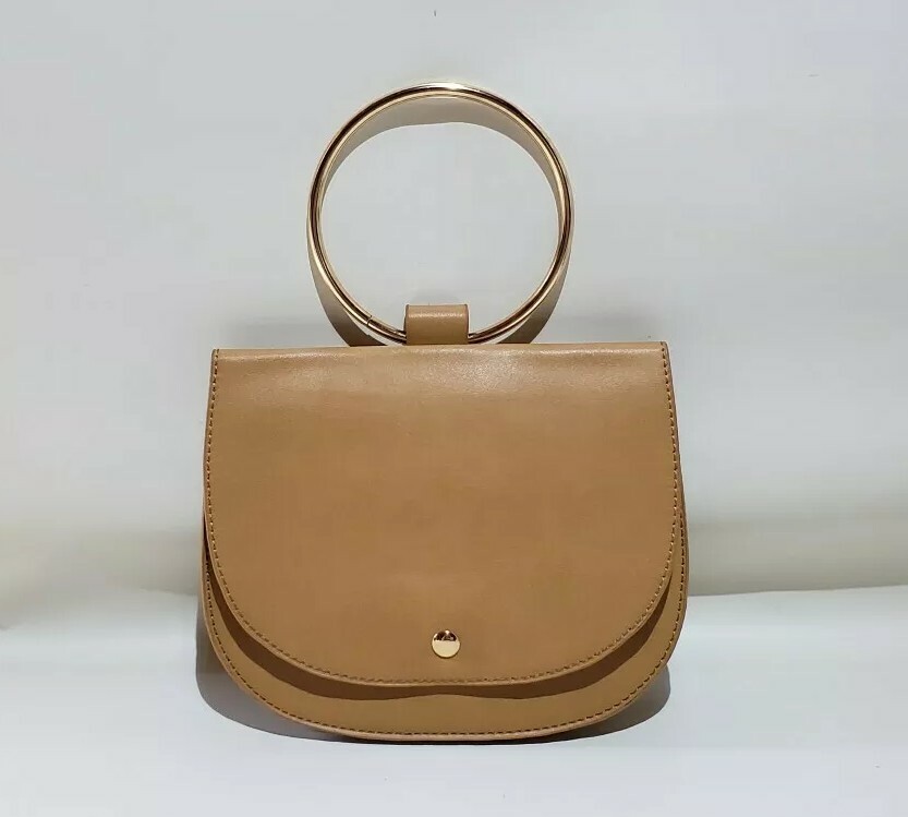 Madison West Julia tanClutch With Gold Metal Ring Handle Polyurethane aka vegan