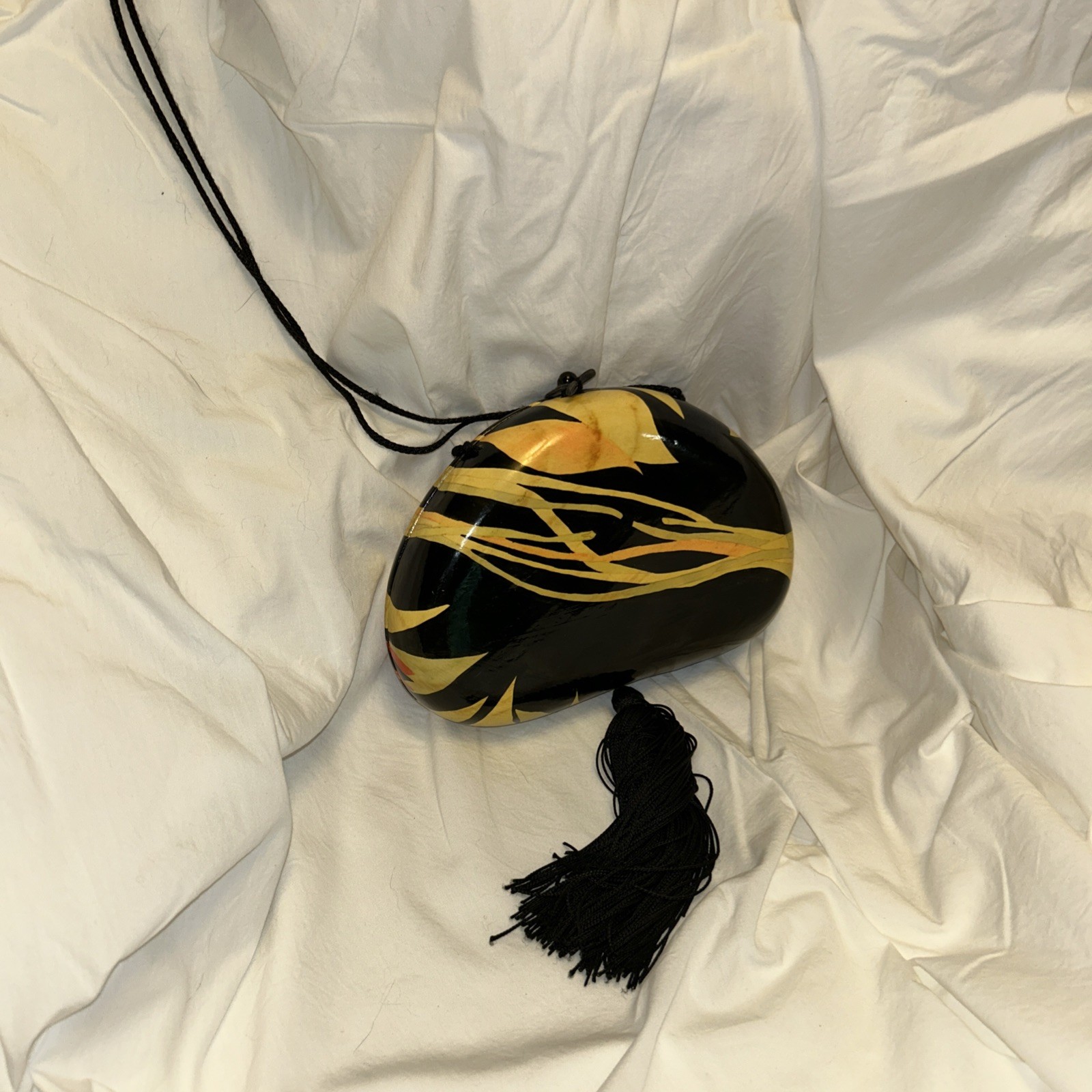 Rafael Sanchez hand painted wooden lacquered tassle purse