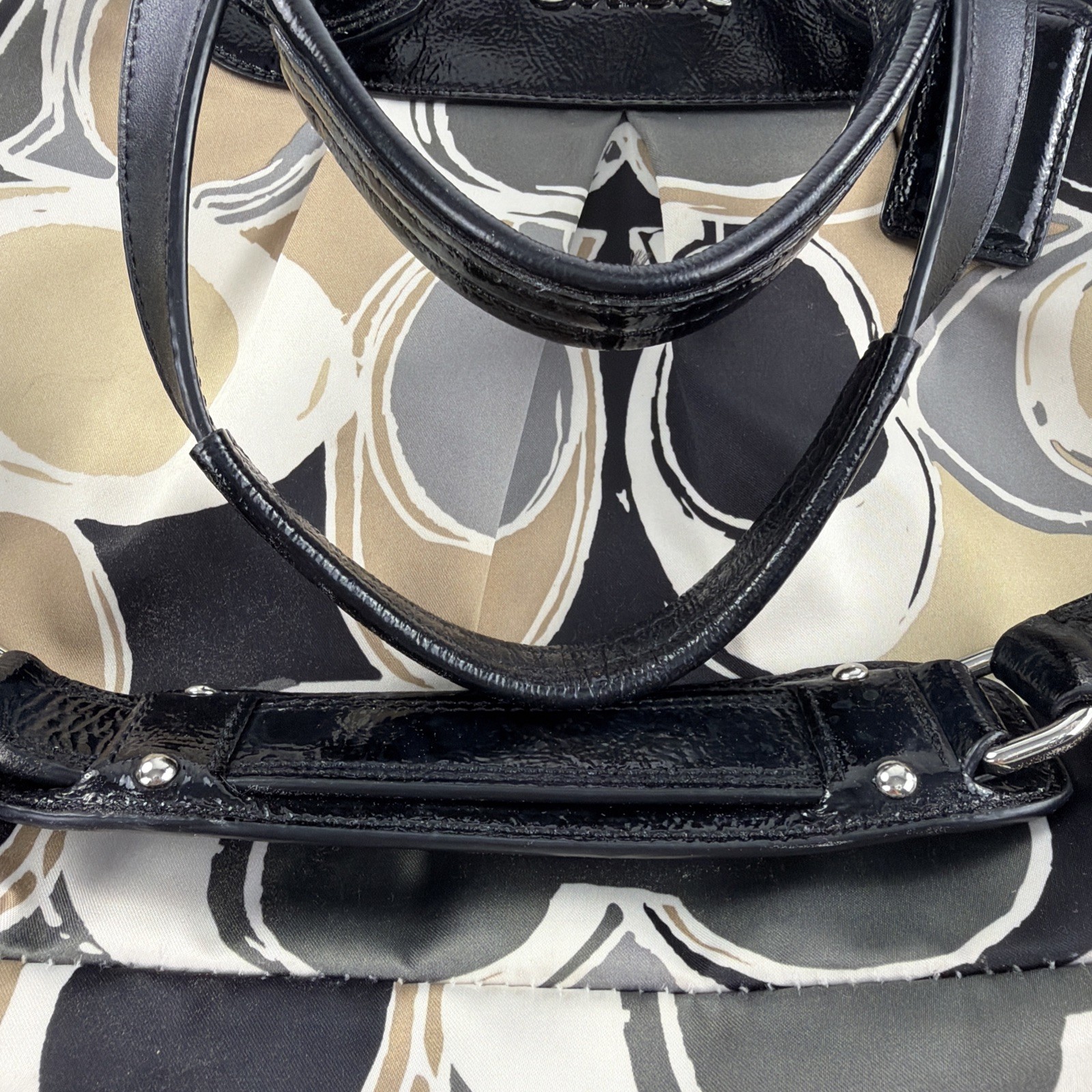Coach Ashley Signature Satchel featuring a black, gray, and tan F17644