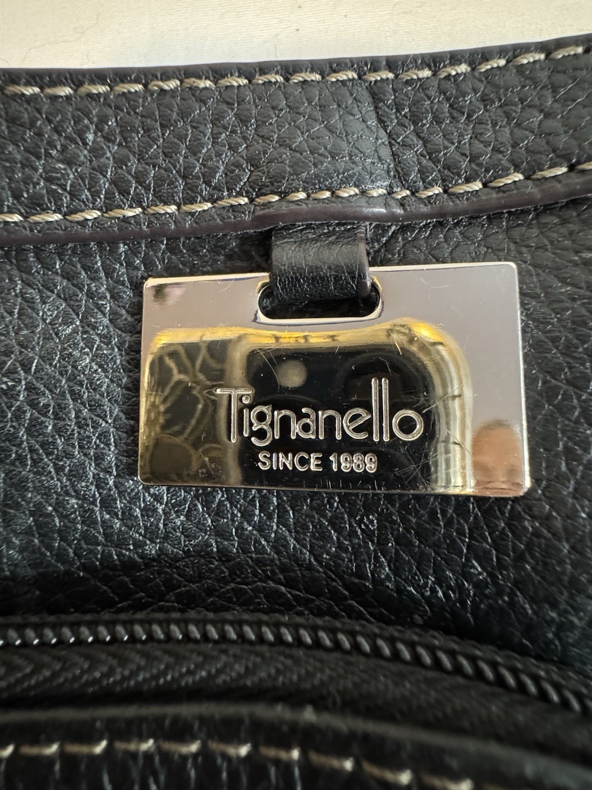 Tignanello Black Pebbled Leather Crossbody Bag White Accent Stitching & Logo