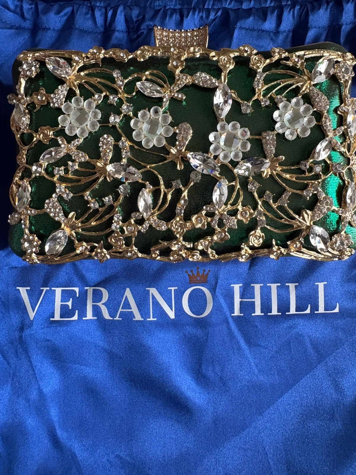 Verano Hill green velvet clutch bag with a crystal and gold-tone embellishment