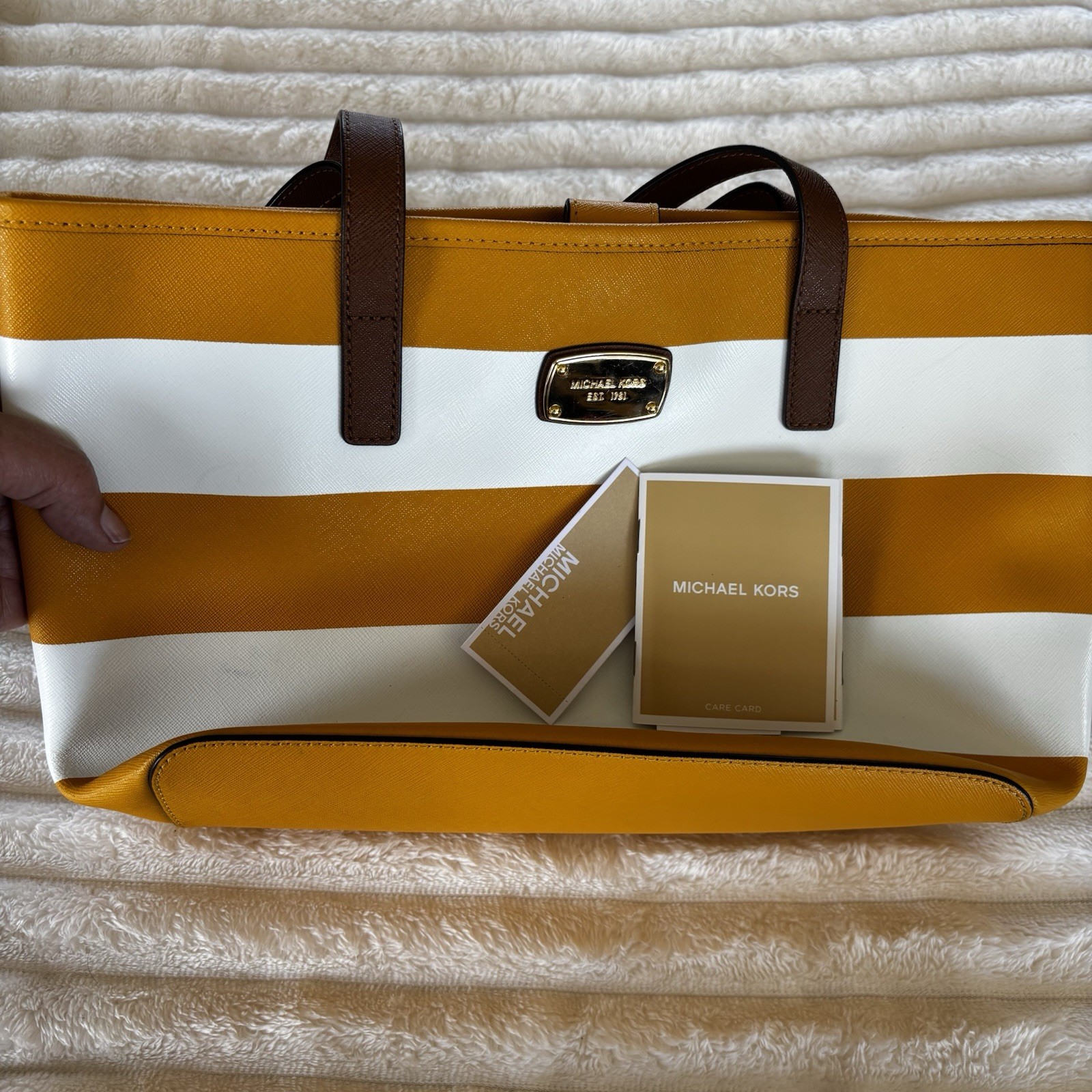 Michael Kors purse, Yellow And White Stripped, With Brown Straps.