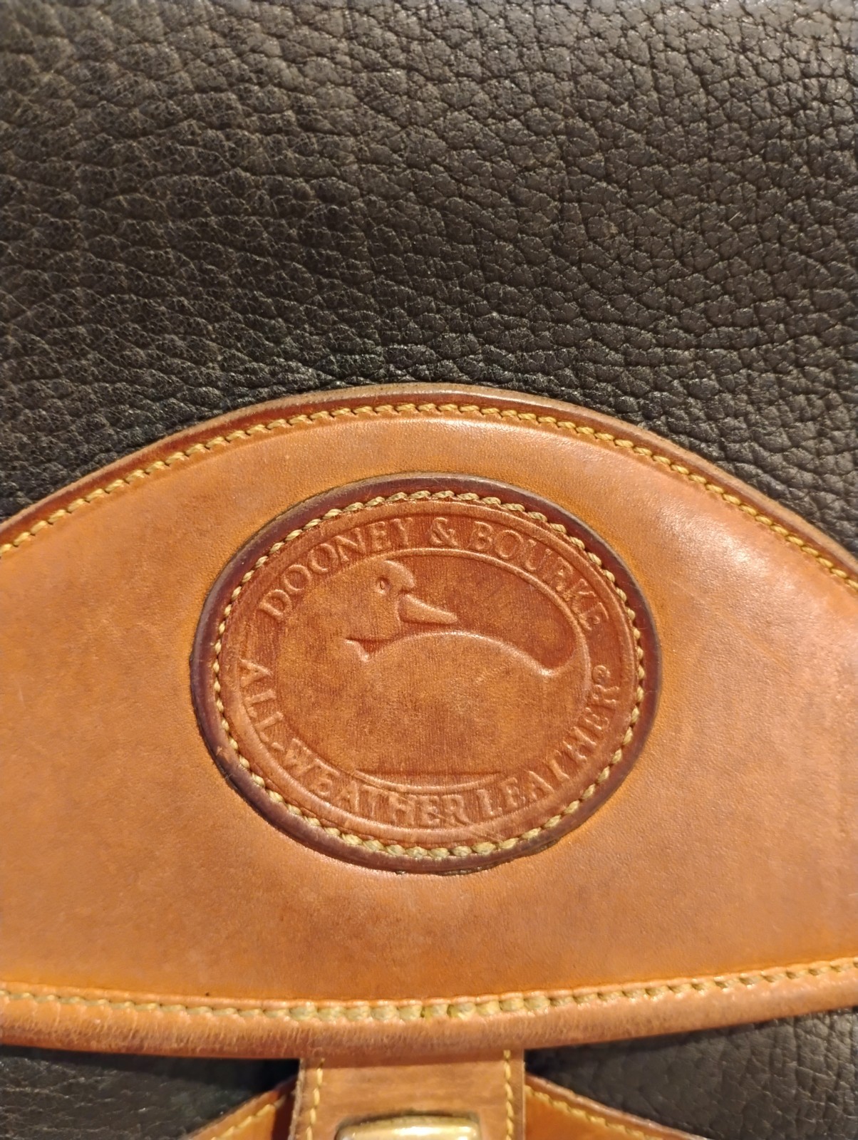 Vintage Dooney & Bourke All-Weather Leather Crossbody Bag Black with Brown Trim