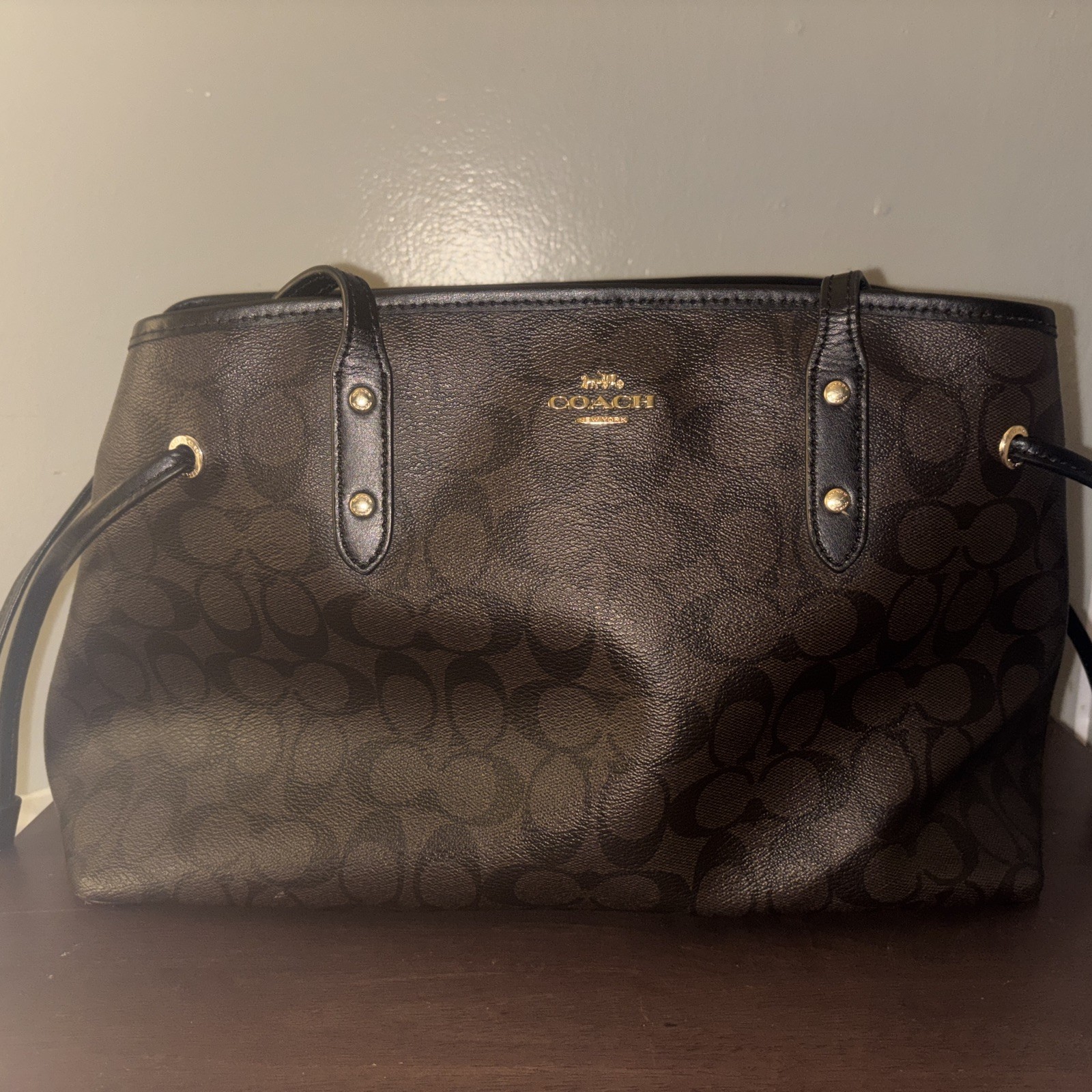 Coach Brown Black Logo Shoulder Bag with Double Handles and Zip Closure