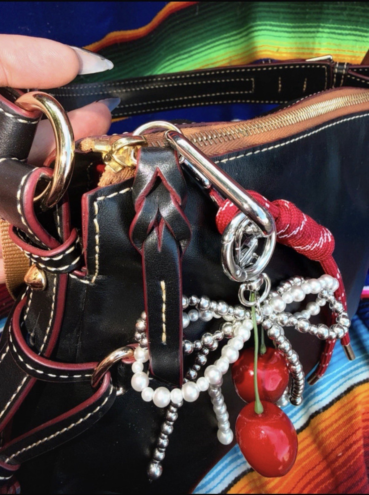 Dooney & Bourke Black Shoulder Bag. Charms included.