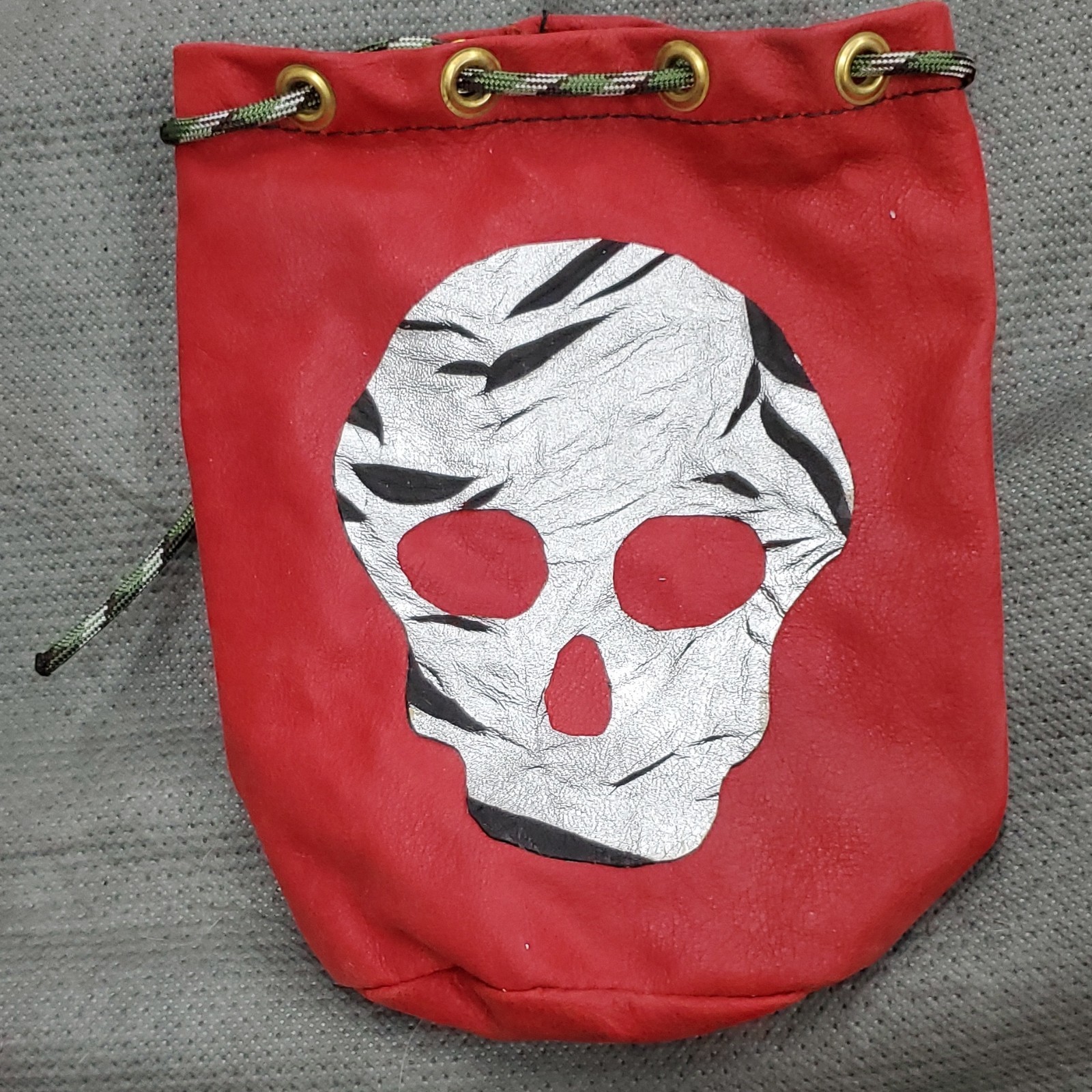 Red Small Skull Graphic Drawstring Bag Grommets Gold HW Leather Lining