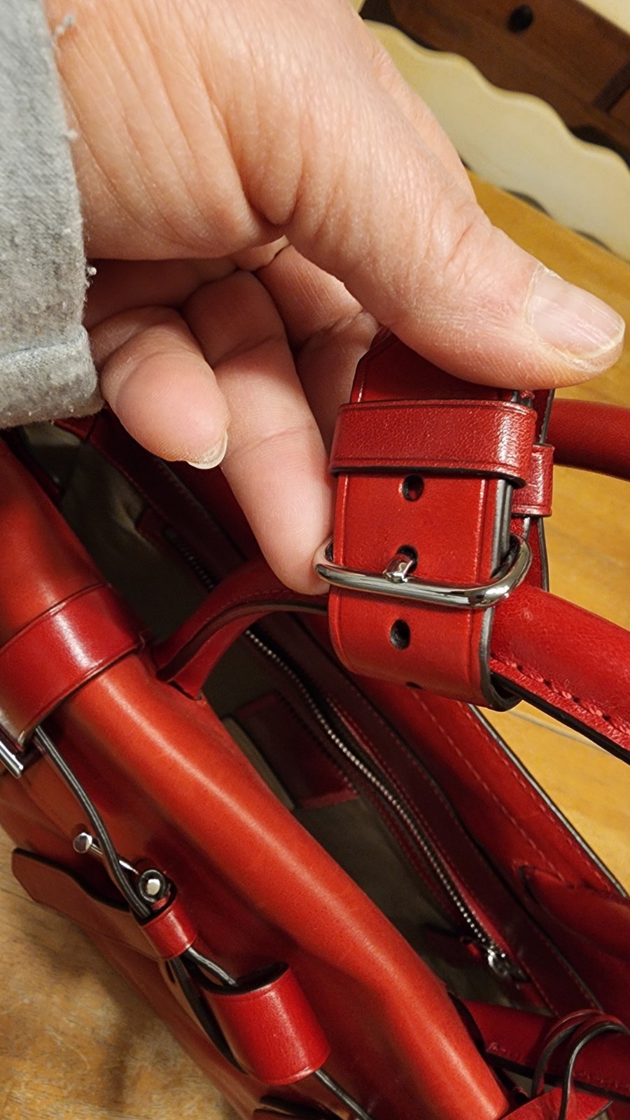 red leather Reed Krakoff Boxer Tote Bag, dual rolled handles & belt detailing.