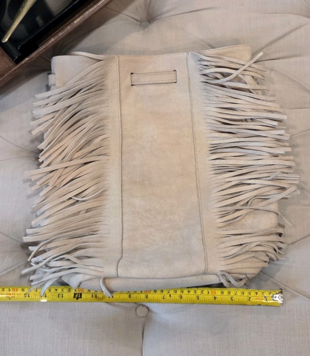 Loli Degano Suede Leather Backpack Drawstring Bucket Bag Western-Chic Fringe