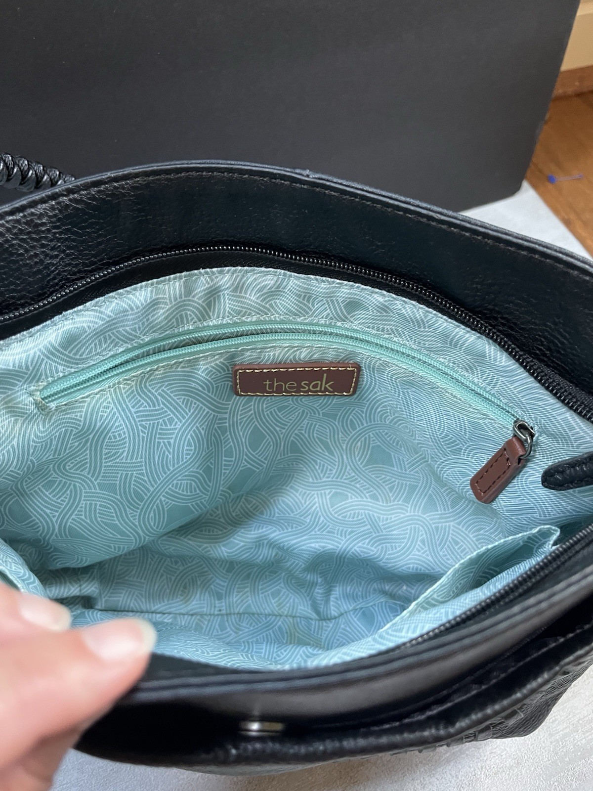 The Sak Black Indio Pebble Leather Hobo Purse Teal Interior