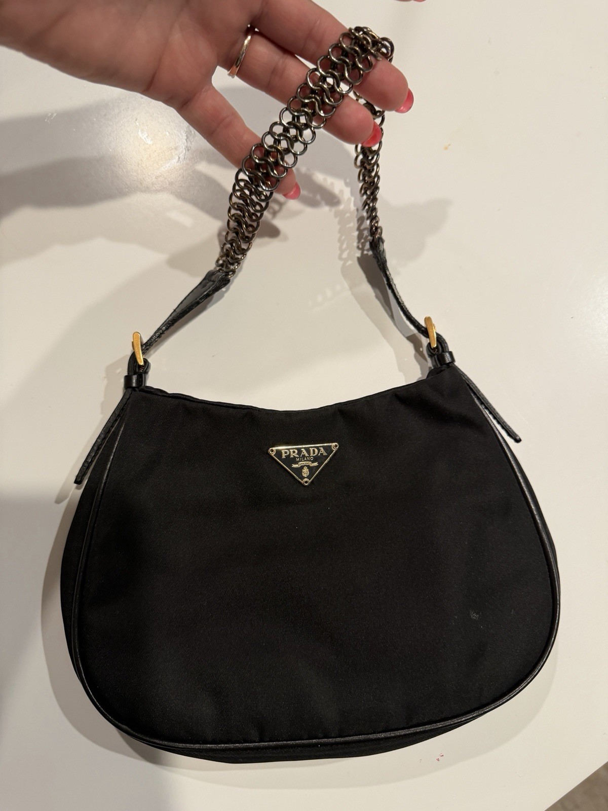 Gently used Prada Cleo handbag, Black in Polyester $