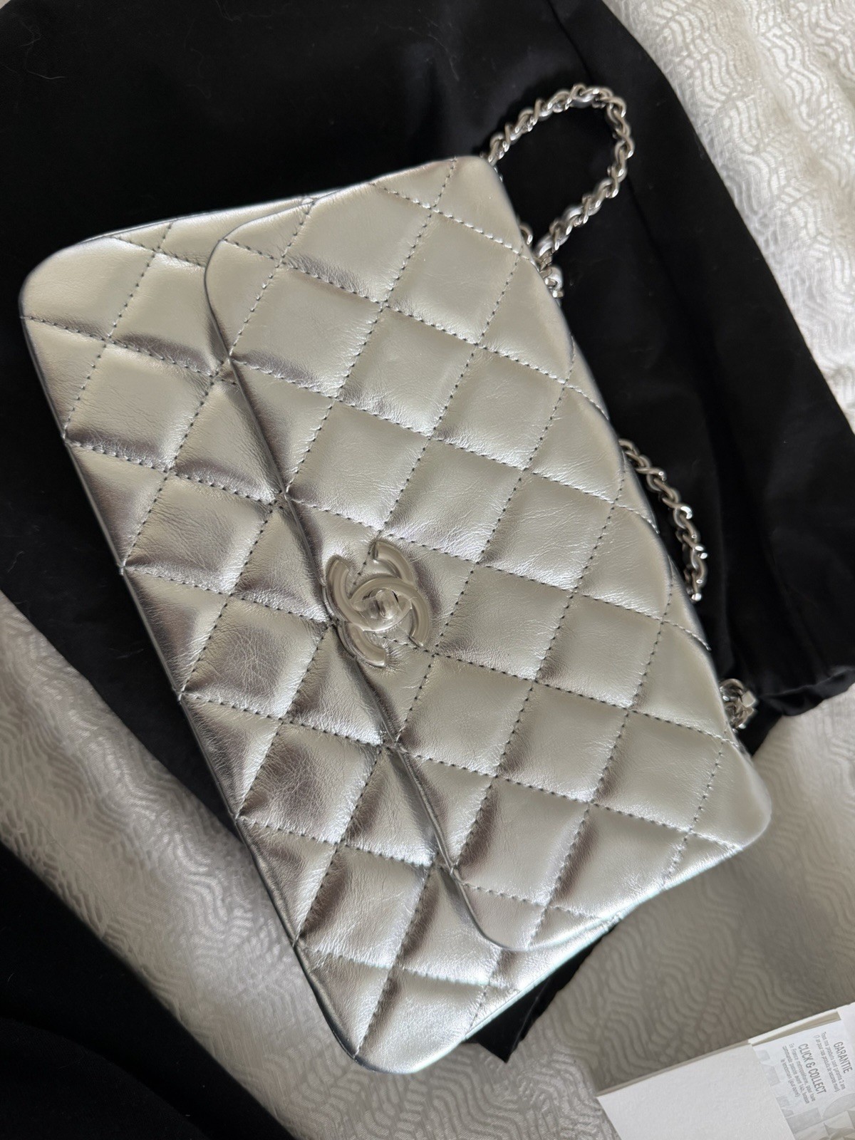 AUTHENTIC CHANEL 25p flap bag in silver