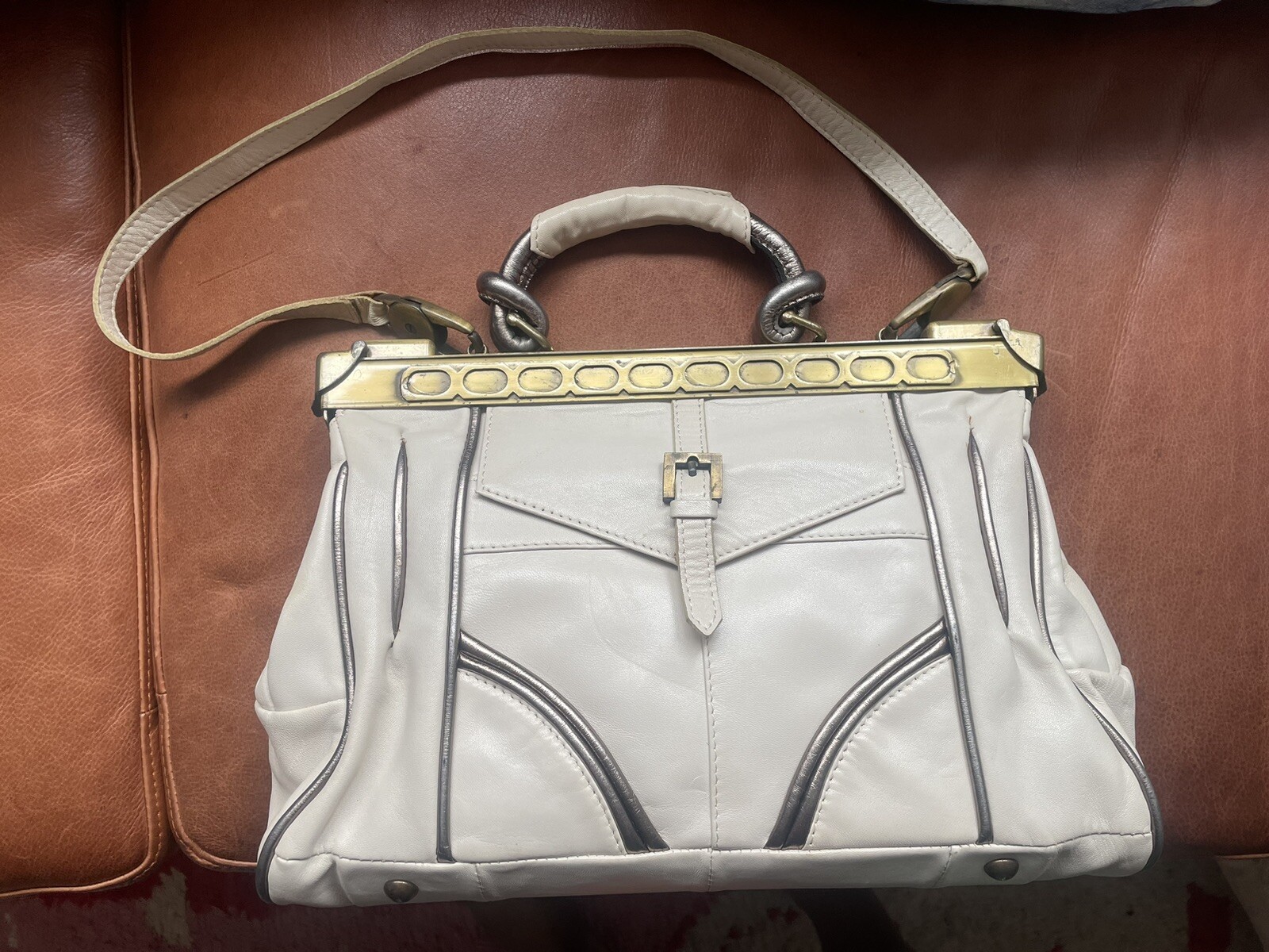 Off-white leather bag,antique gold brass (Flavi Olivera)+anthropologie magazine