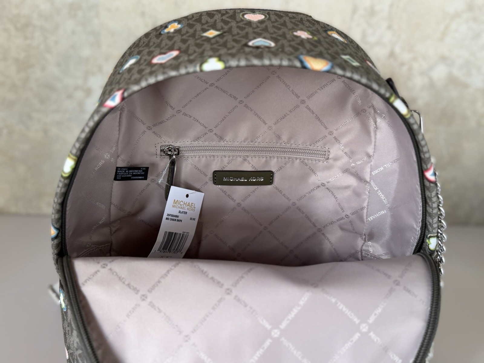 Michael Kors Slater Medium Chain Backpack MK Hearts Spades Diamonds Clubs Olive