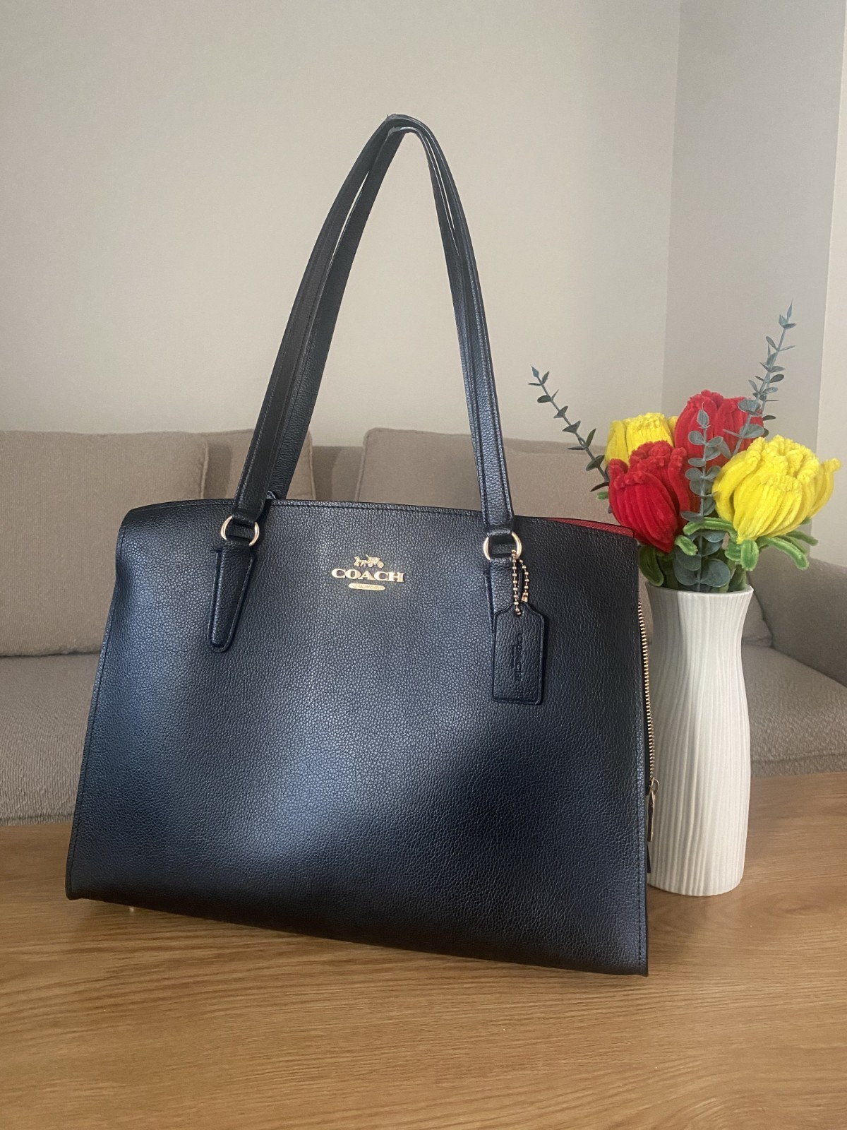 Coach Tatum Carryall 40 tote bag in black/true red. Used, in good condition.