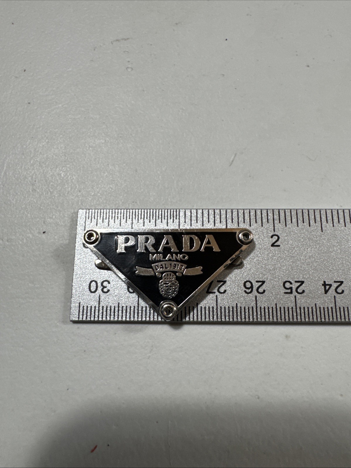 VTG Prada Milano 1913 Silver & Black Triangle Logo Purse Pendant Badge Bolo Tie