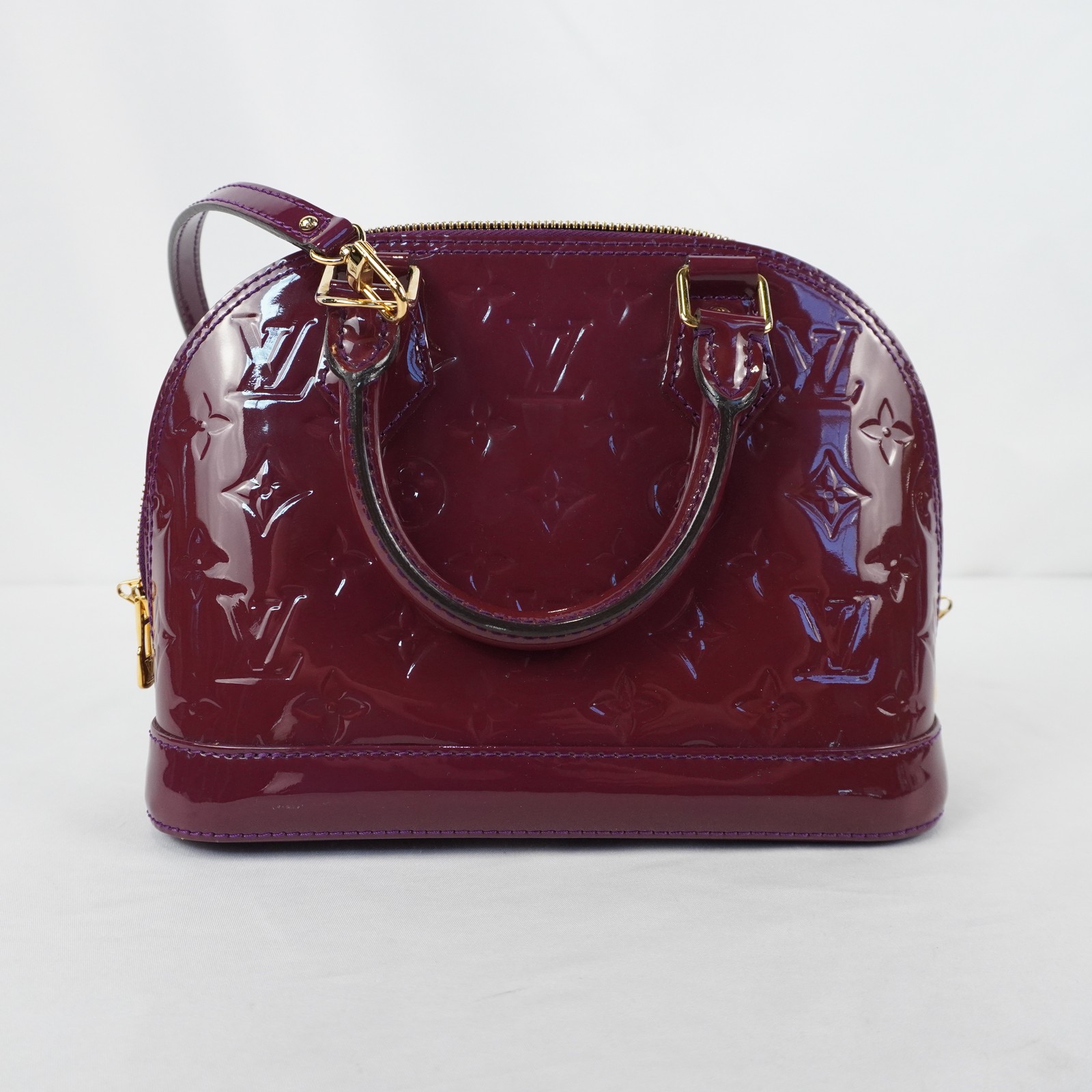 Louis Vuitton Vernis Monogram Alma BB Handbag In Burgundy With Gold Hardware