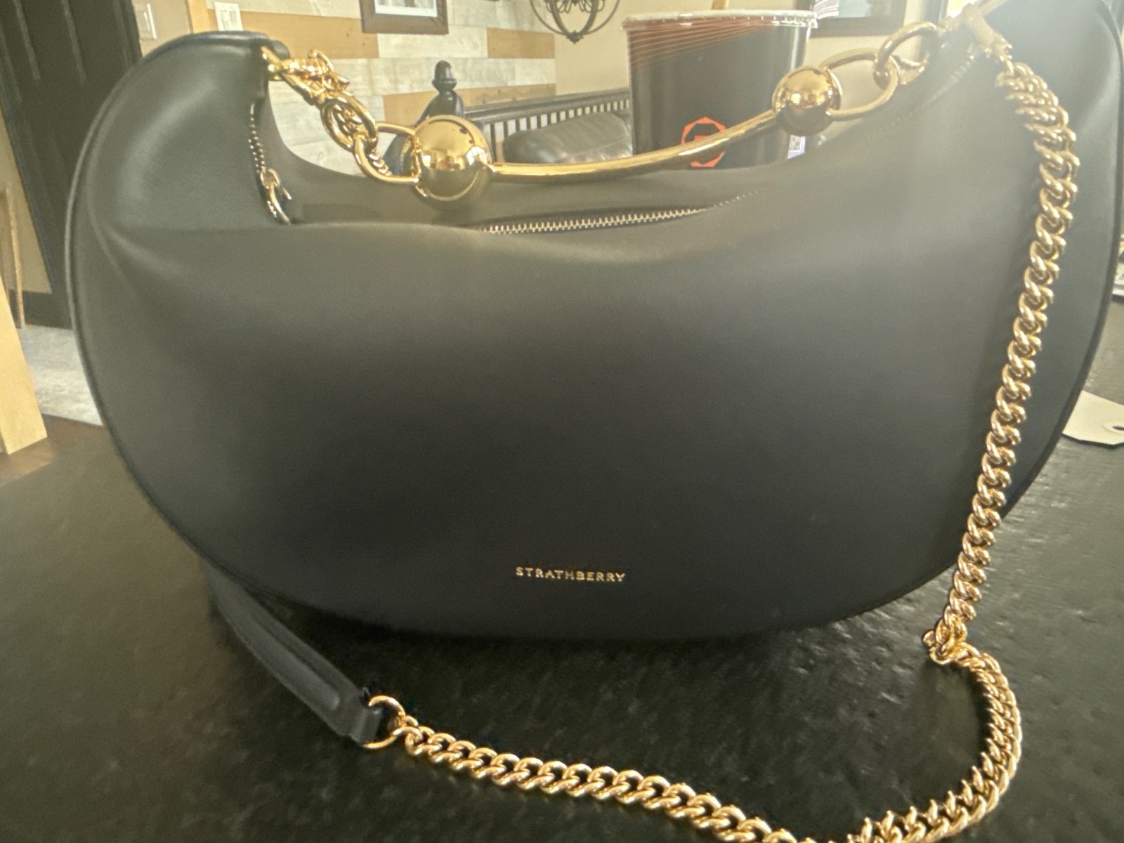 strathberry black leather crescent bag. Used once