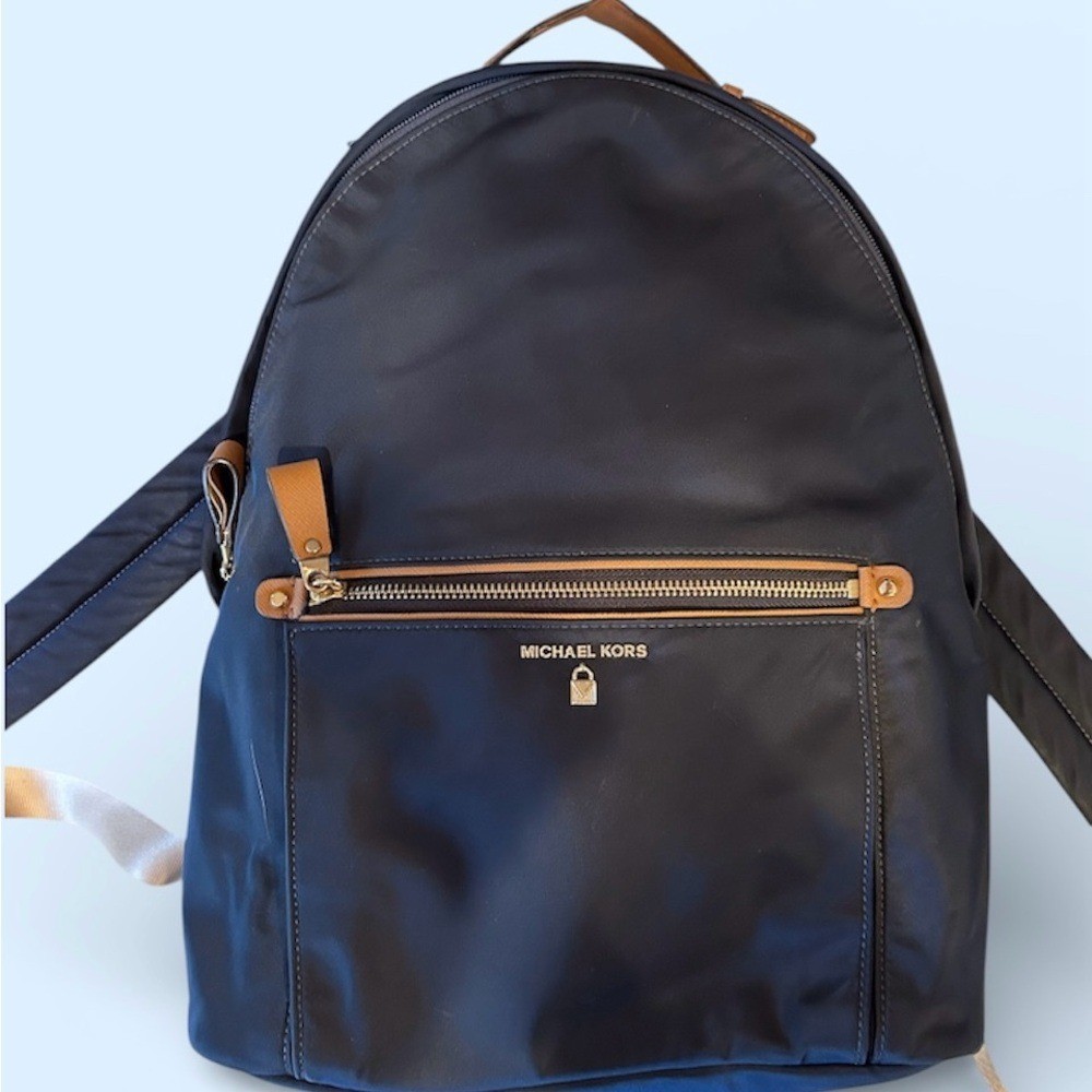 Michael Kors “Kelsey” Navy and Tan Backpack