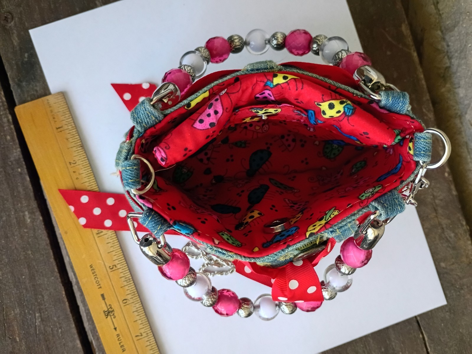 Small, Blue Jean Embroidered Lady Bug with handles and long chain strap