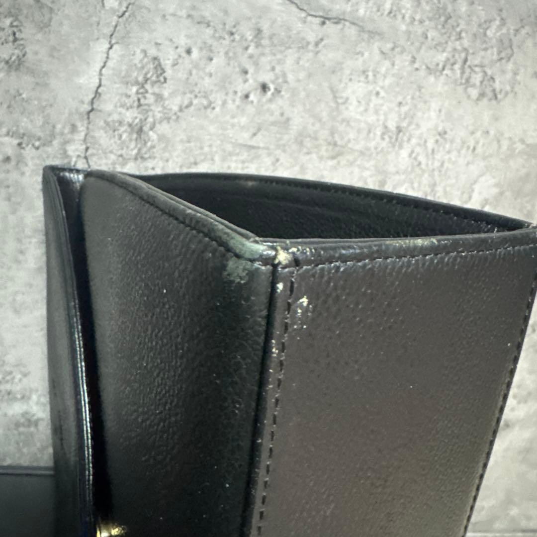 Yves Saint Laurent Handbag Leather Black button Cassandra formal Condition Used