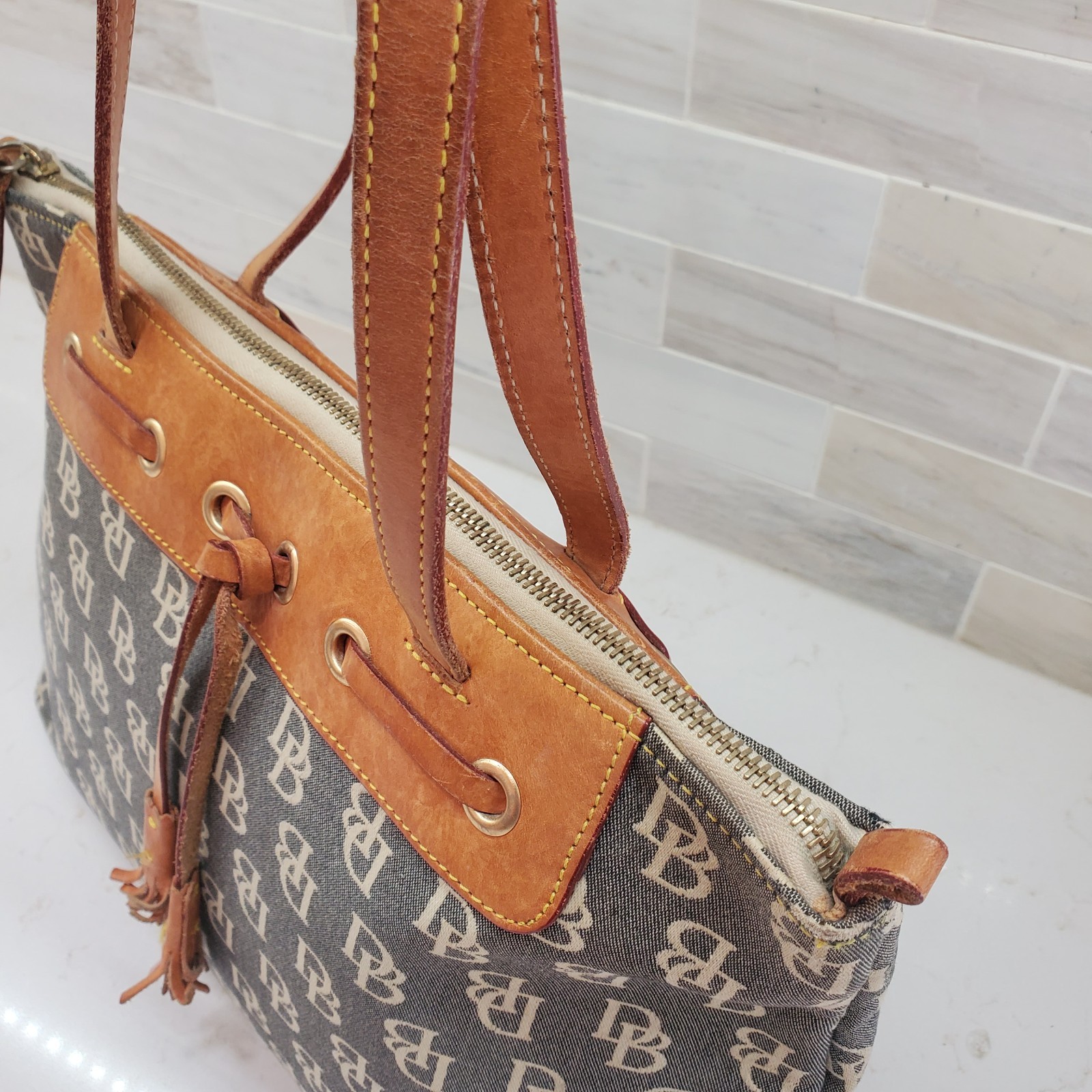 Dooney & Bourke Large Tassel Top Zip Bag Leather &Logo Fabric Double Handle
