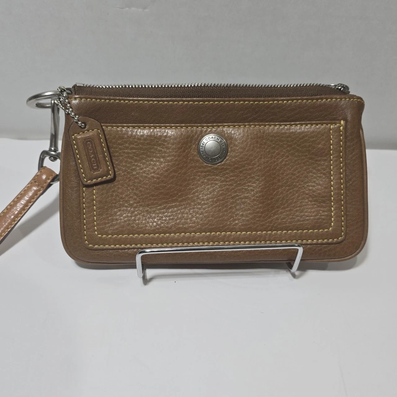 Coach Vintage Brown Leather Clutch/Wristlet Mini Logo Tag. Zippered. Logo Button