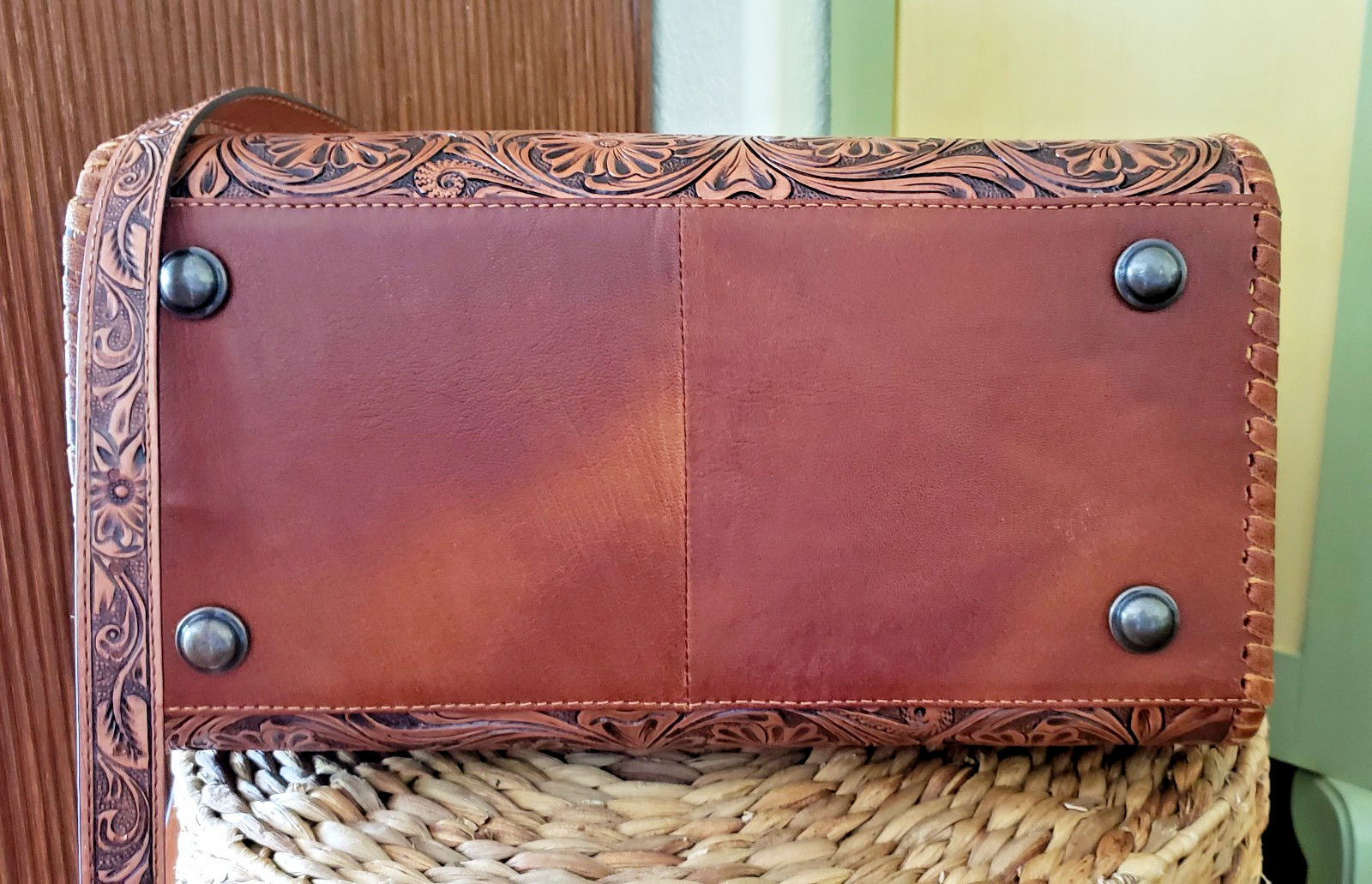 Chestnut Brown Hand-Tooled Leather Duffle Bag with Detailed Floral Design