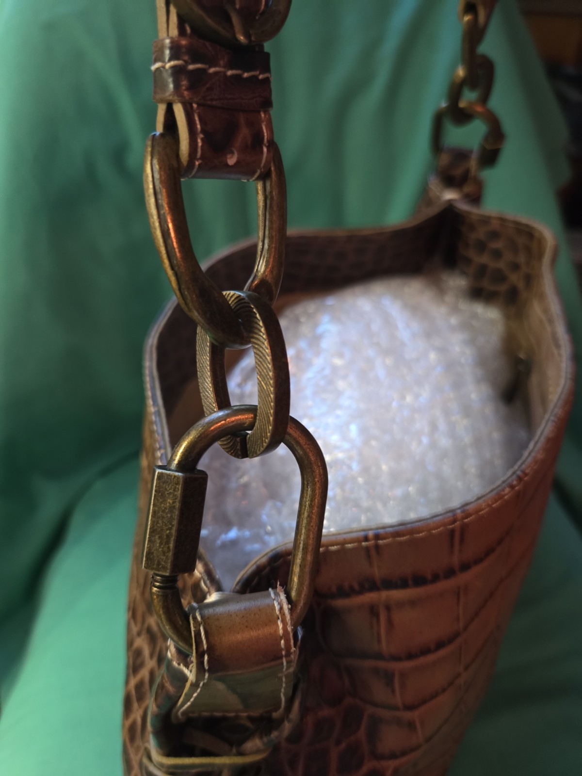 This is a Robert Pietri GENUINE LEATHER tan Crock Enbossed Bag