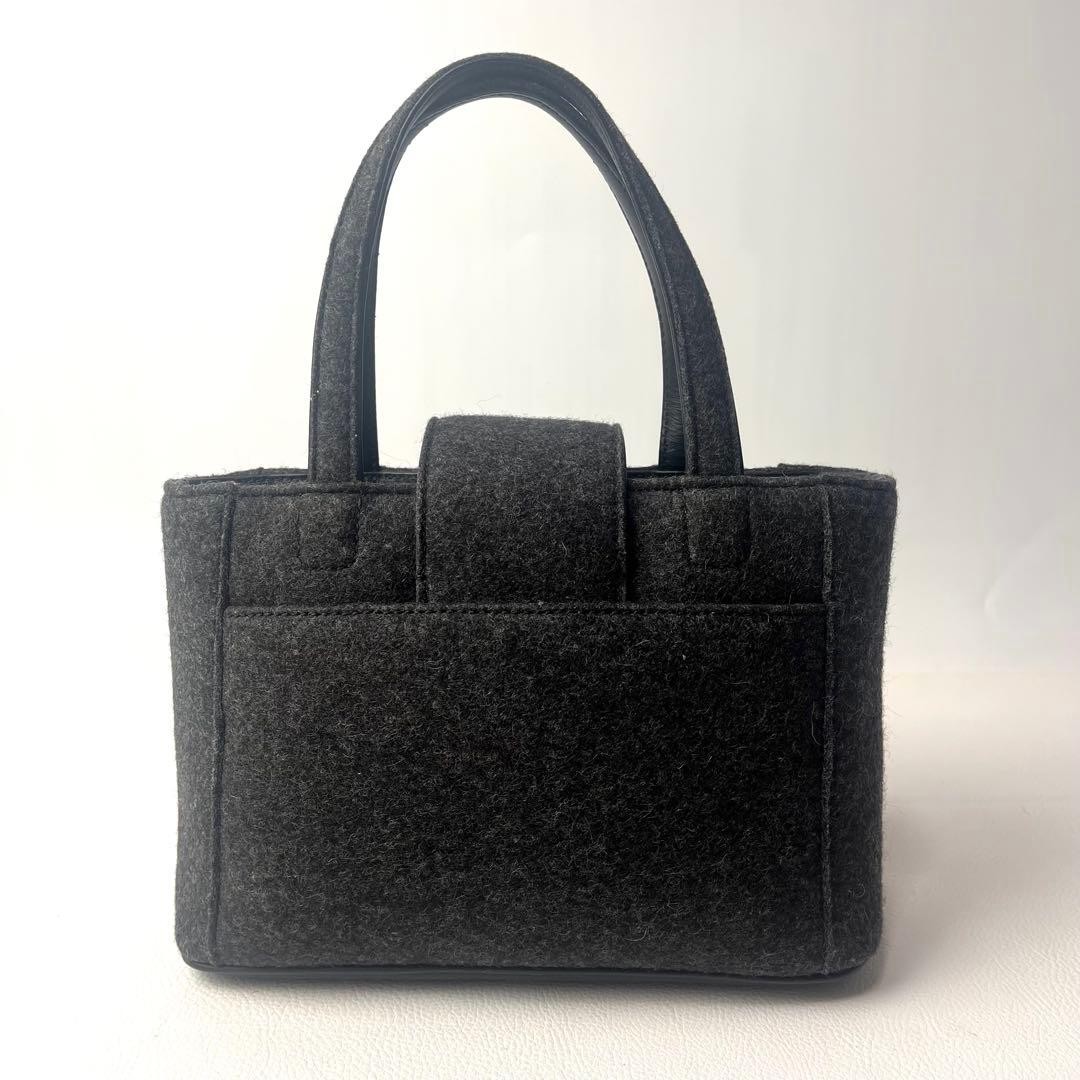 Excellent condition COACH mini handbag turn lock self standing wool gray 15a