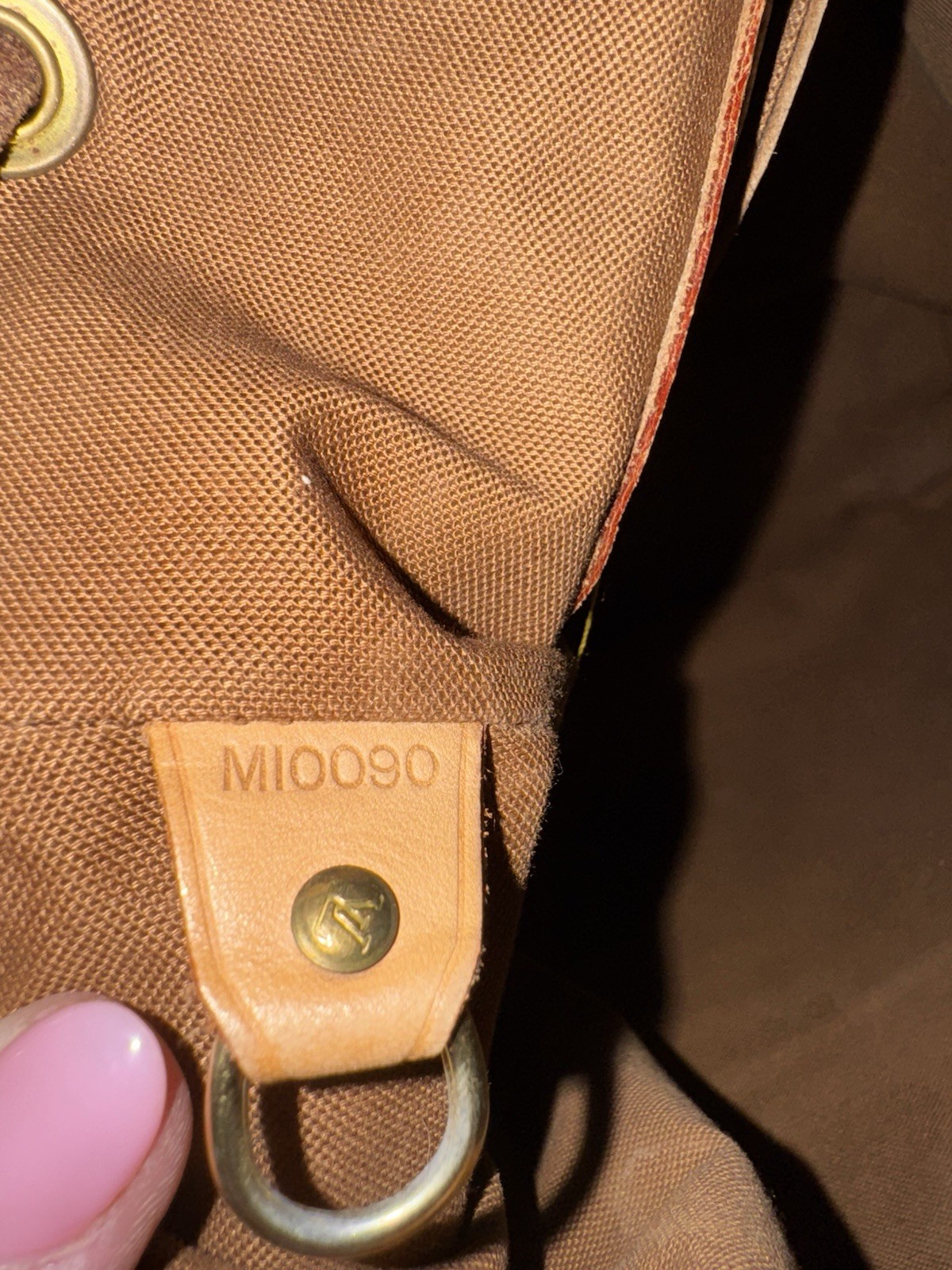 Moderate scuffs at corner base and at closure,minor discoloration throughout,