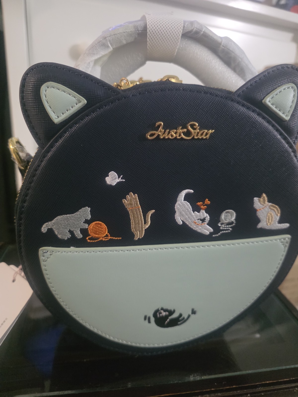 JustStar Cat Round Crossbody Bag Navy/Light Blue Gold Hardware Zip Closure