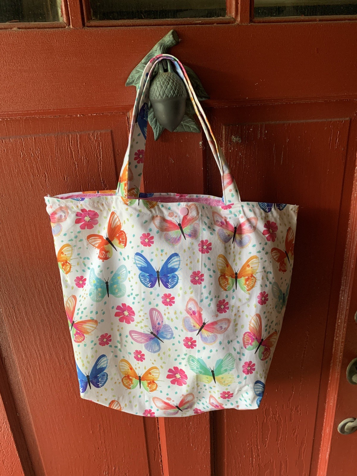 Handmade butterfly tote bag with inner pockets on both sides.