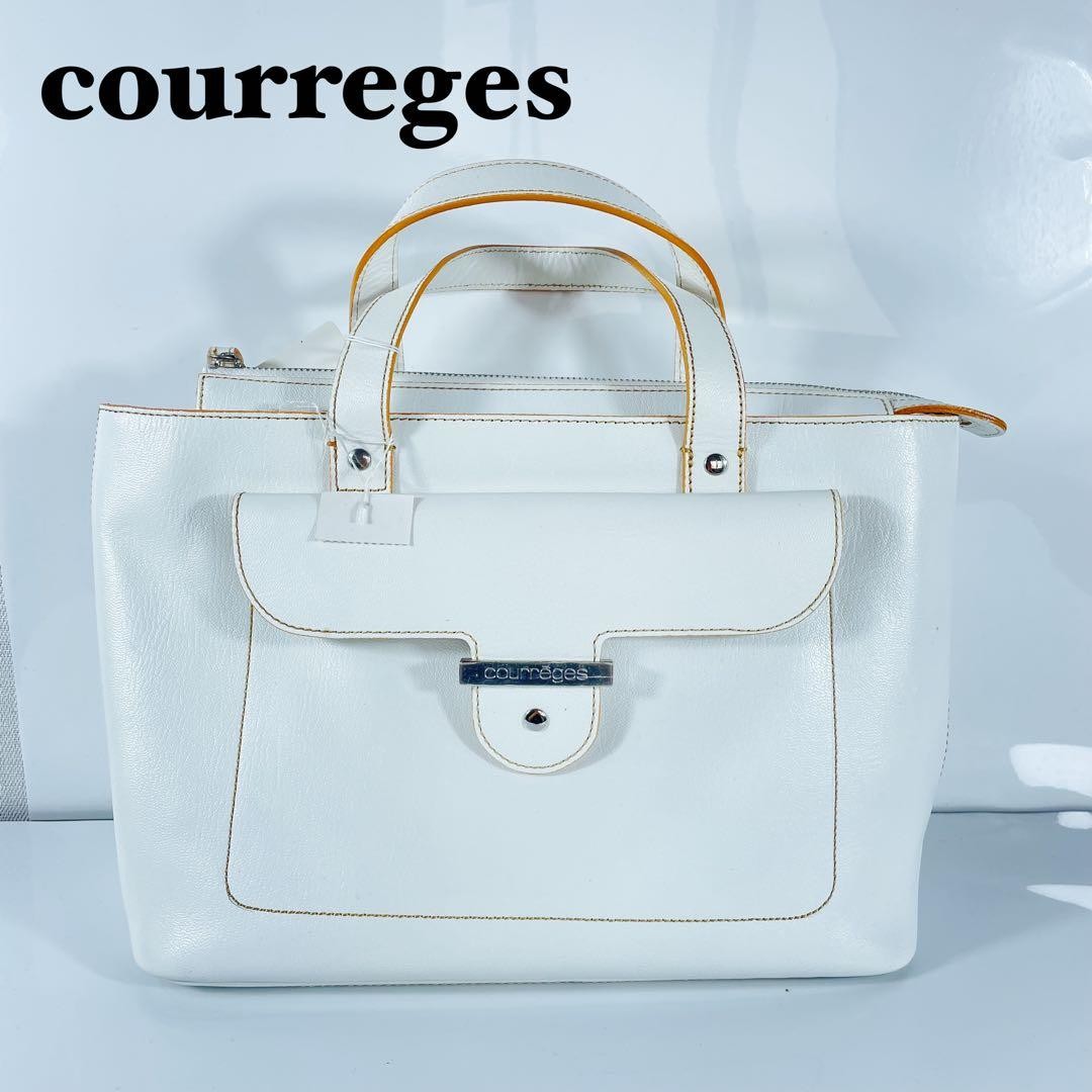 Courreges handbag white 12.9 inches bottom studs and a zippered pocket, NEW