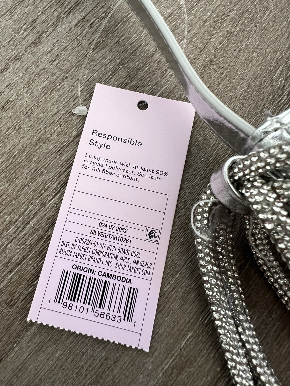 Wild Fable silver shoulder bag features distinct rhinestone-embellished bow