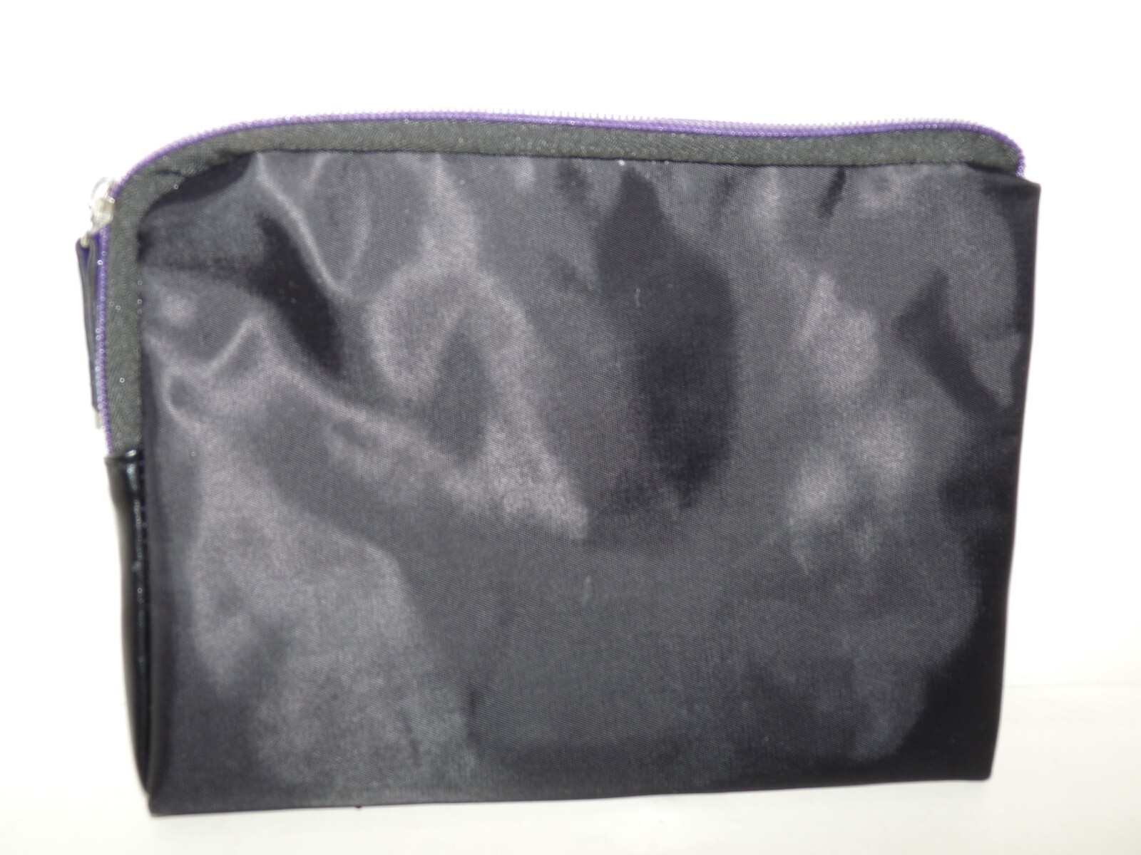 TUMI Delta Small Bag Colors Black and Purple