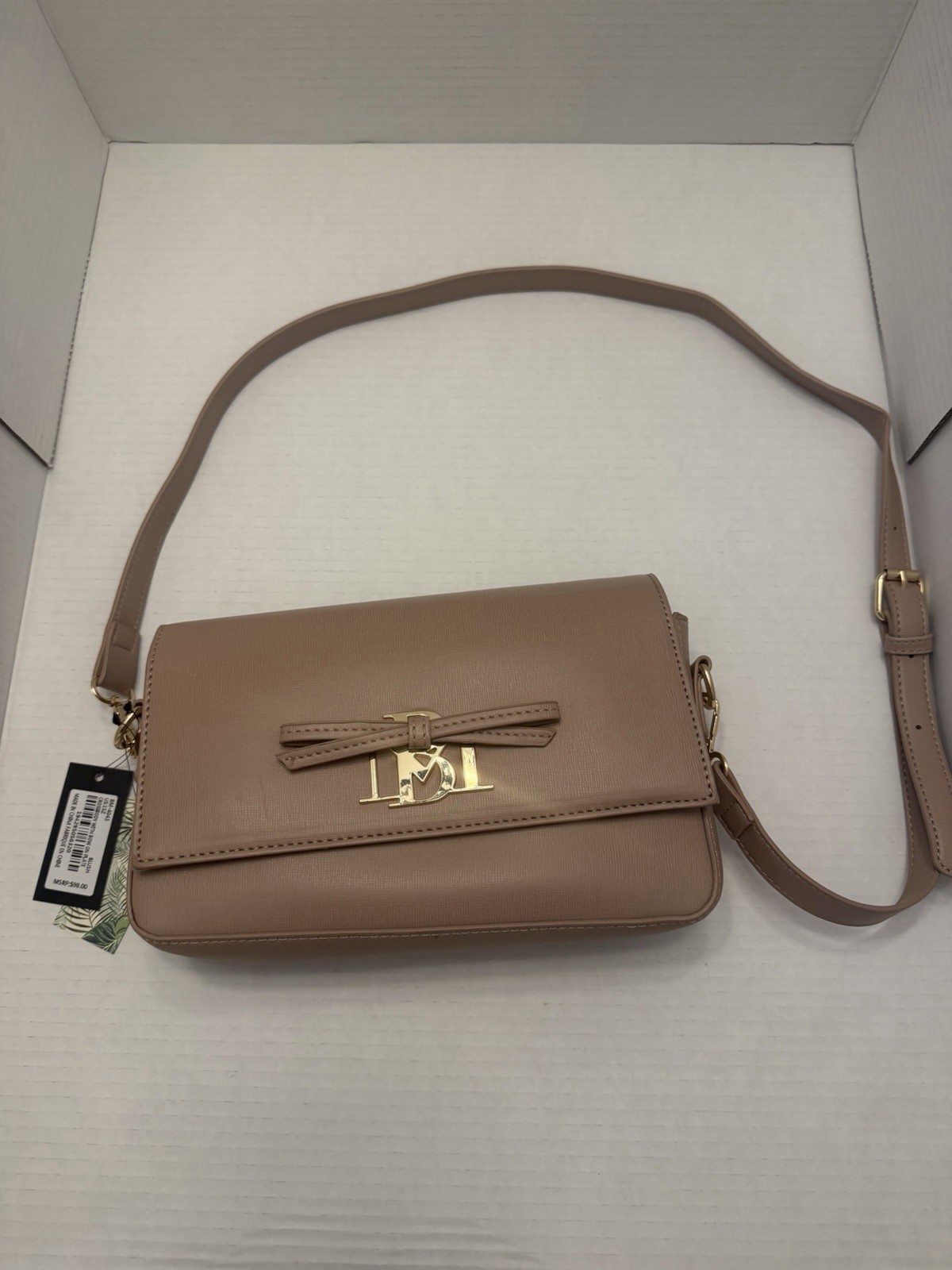 Badgley Mischka Women’s Vegan Leather Blush Purse gold hardware and bow.