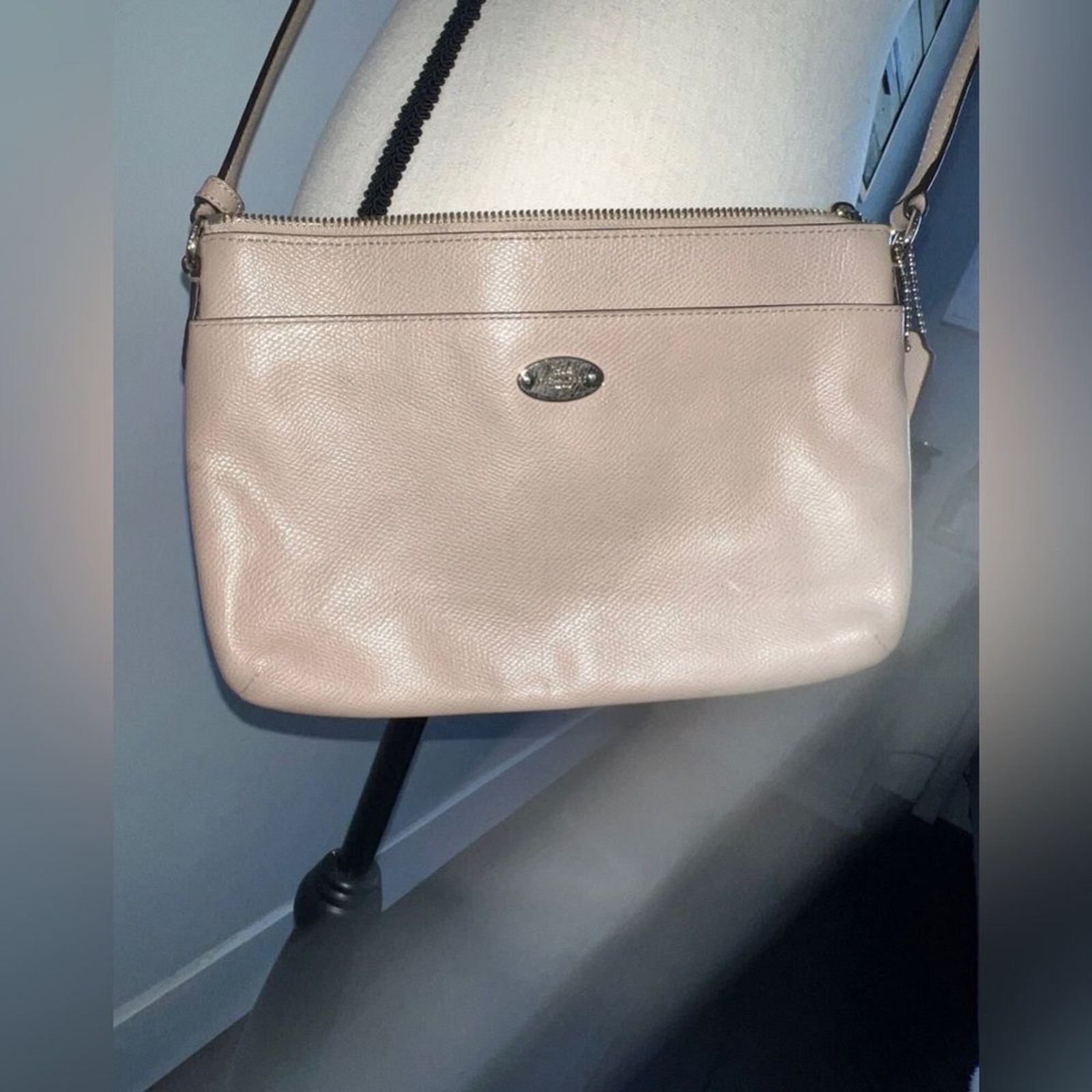 Coach East/West Pop Crossbody bag in tan leather with an adjustable strap
