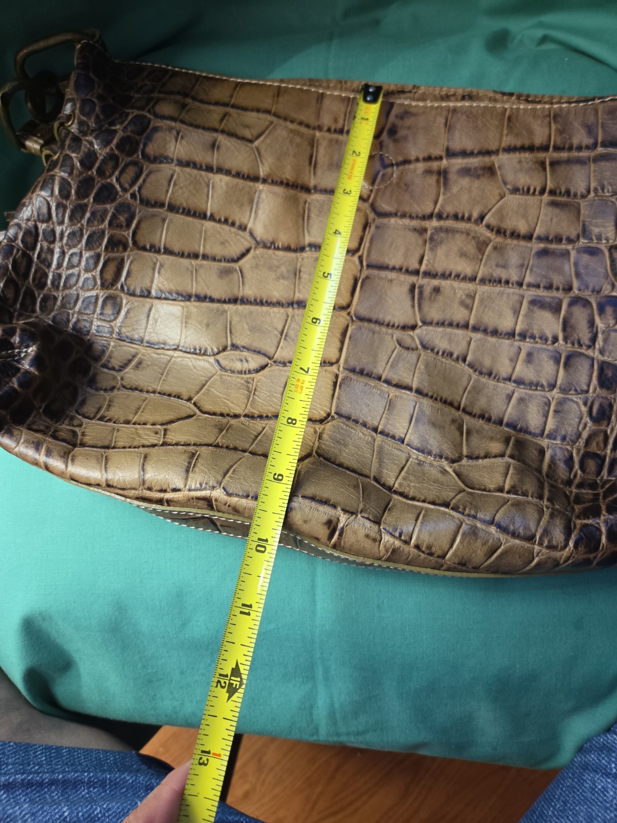 This is a Robert Pietri GENUINE LEATHER tan Crock Enbossed Bag