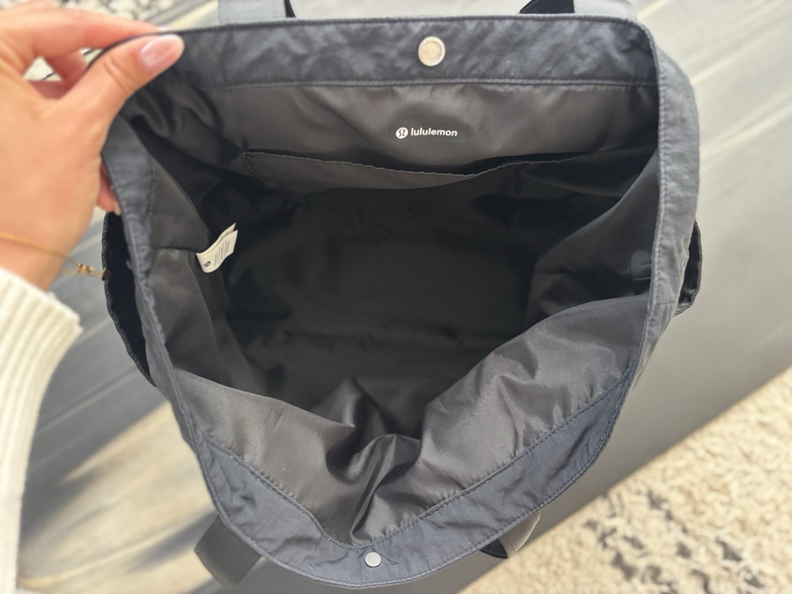 lululemon Black Solid Tote Bag Snap Closure Inner Pockets Silver Hardware