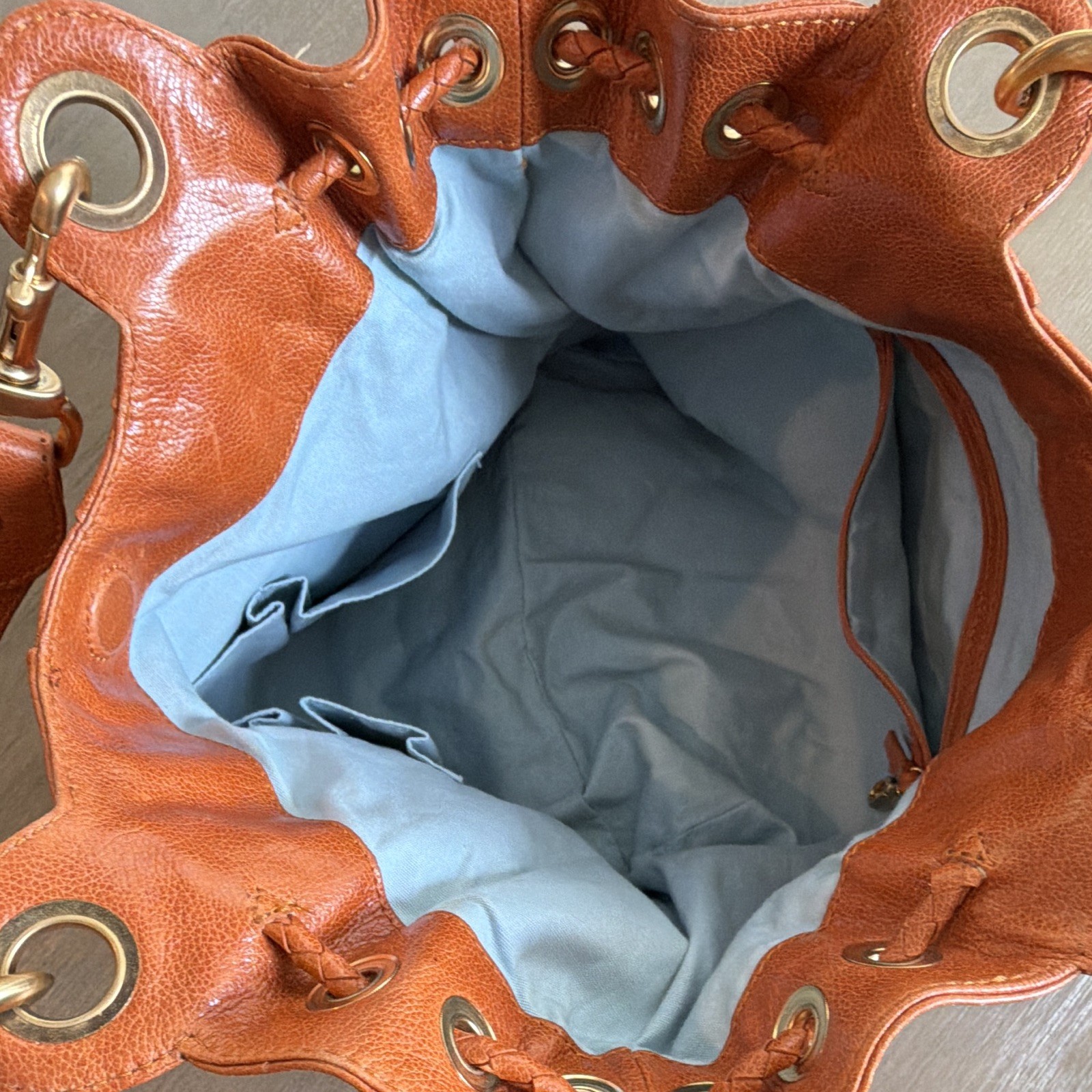 Isabella  Fiore Brown Studded Leather Drawstring Shoulder Bag – Tasseled Strap