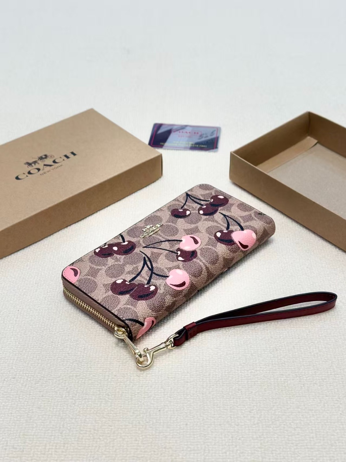 Coach Long Zip Around Wallet In Signature Canvas With Cherry Print CZ328