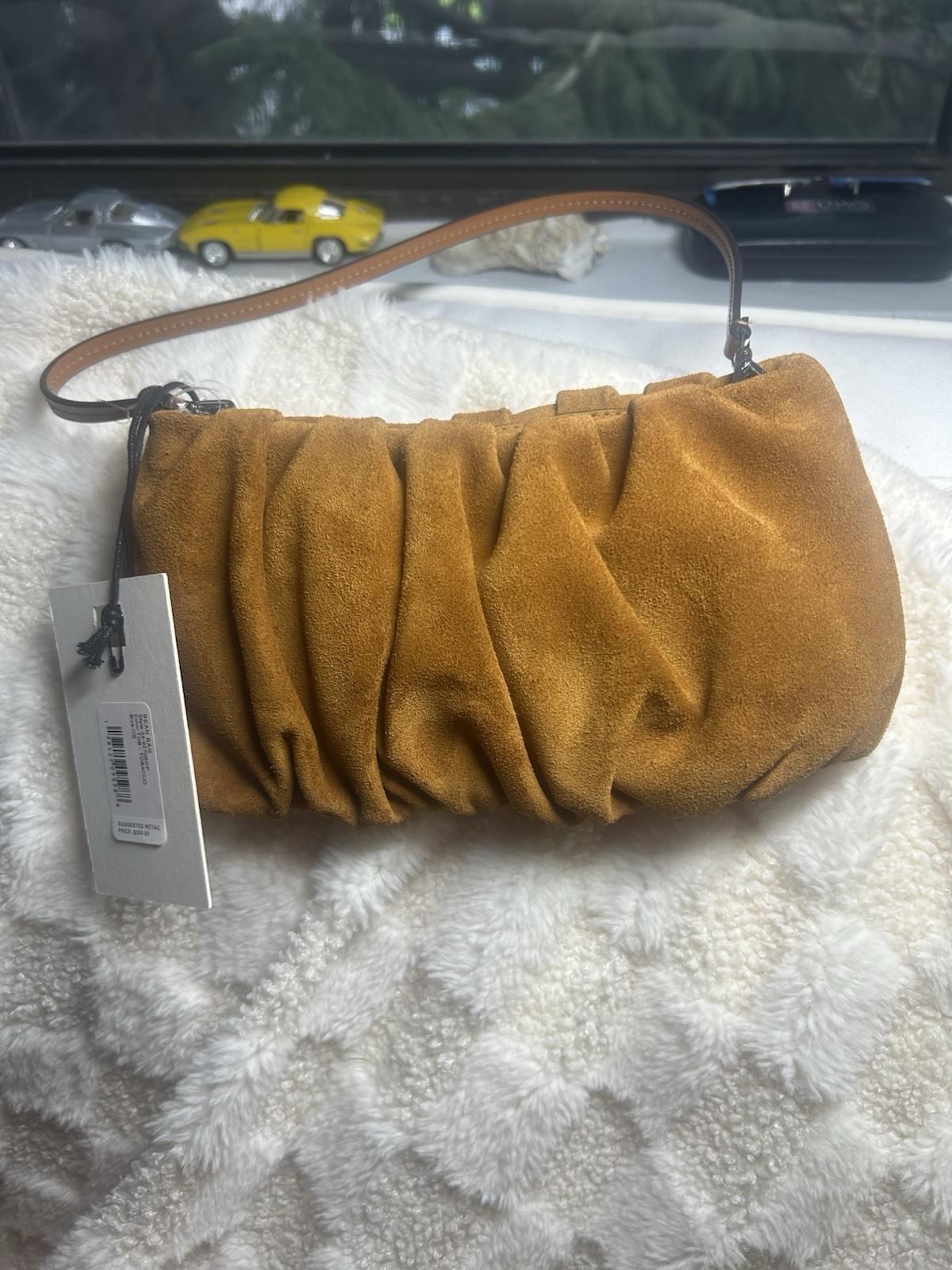 NWT elegant luxurious Staud bean bag / Purse genuine Suede Leather tobacco /Tan