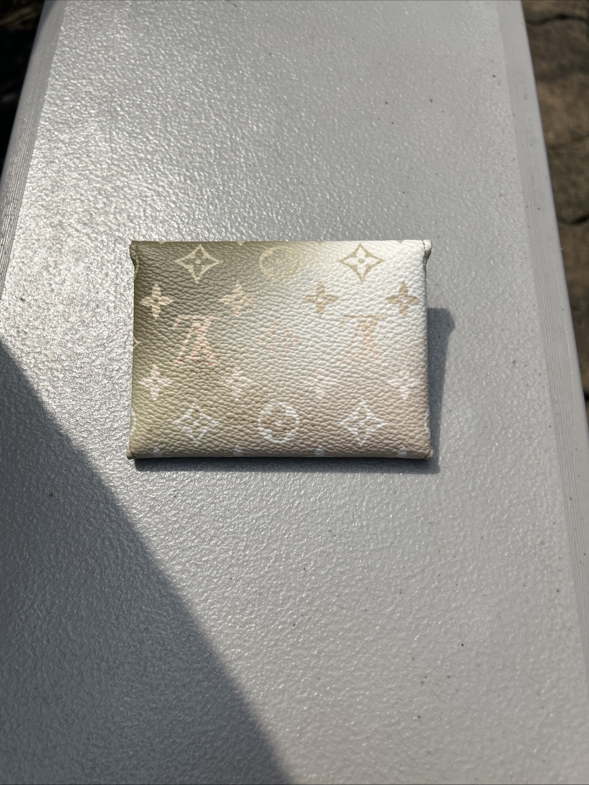 LOUIS VUITTON Pochette Kirigami Monogram/Spring in the City Sunrise Pastel SMALL