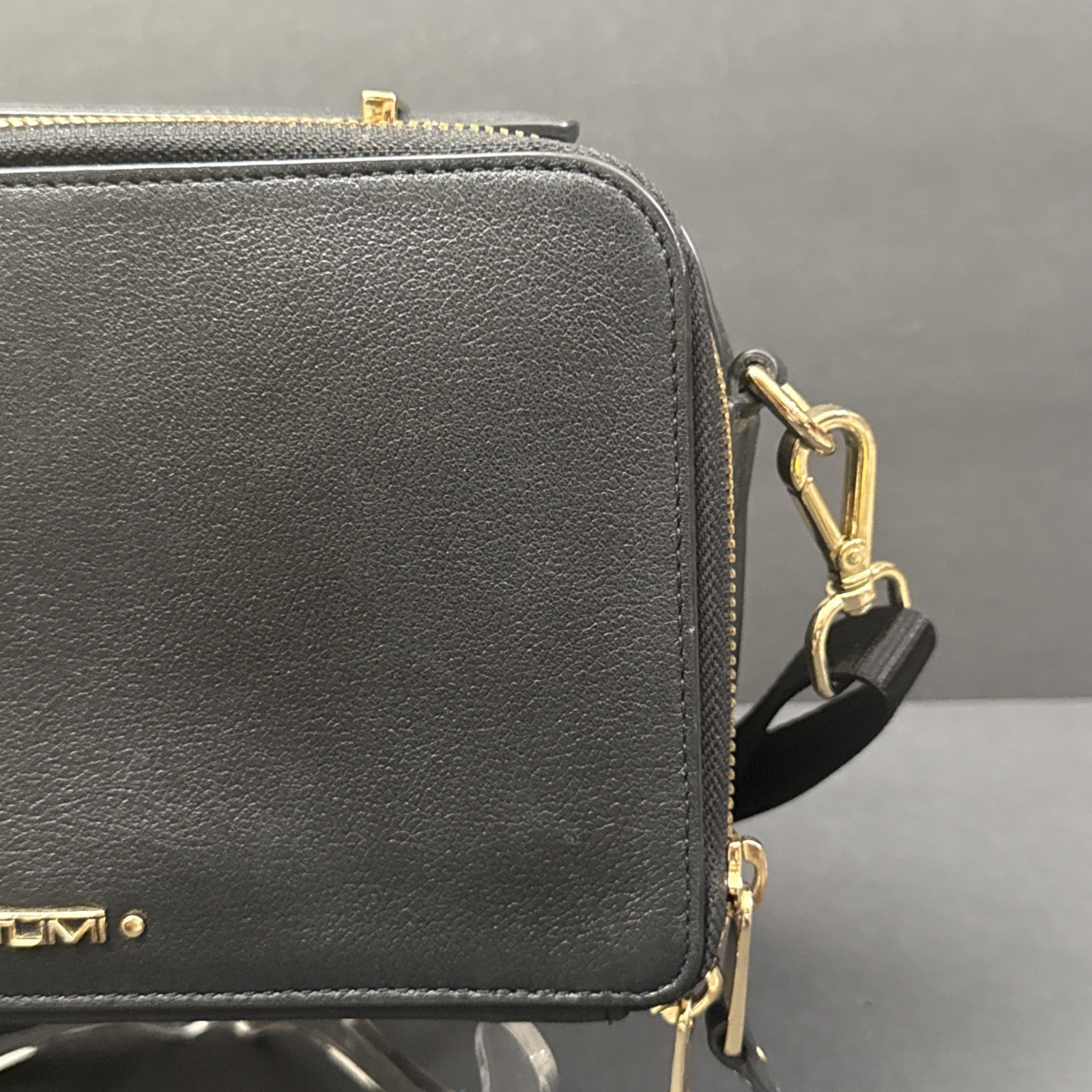 TUMI Black Solid Crossbody Bag Zip Closure Gold Hardware Detachable Strap – READ