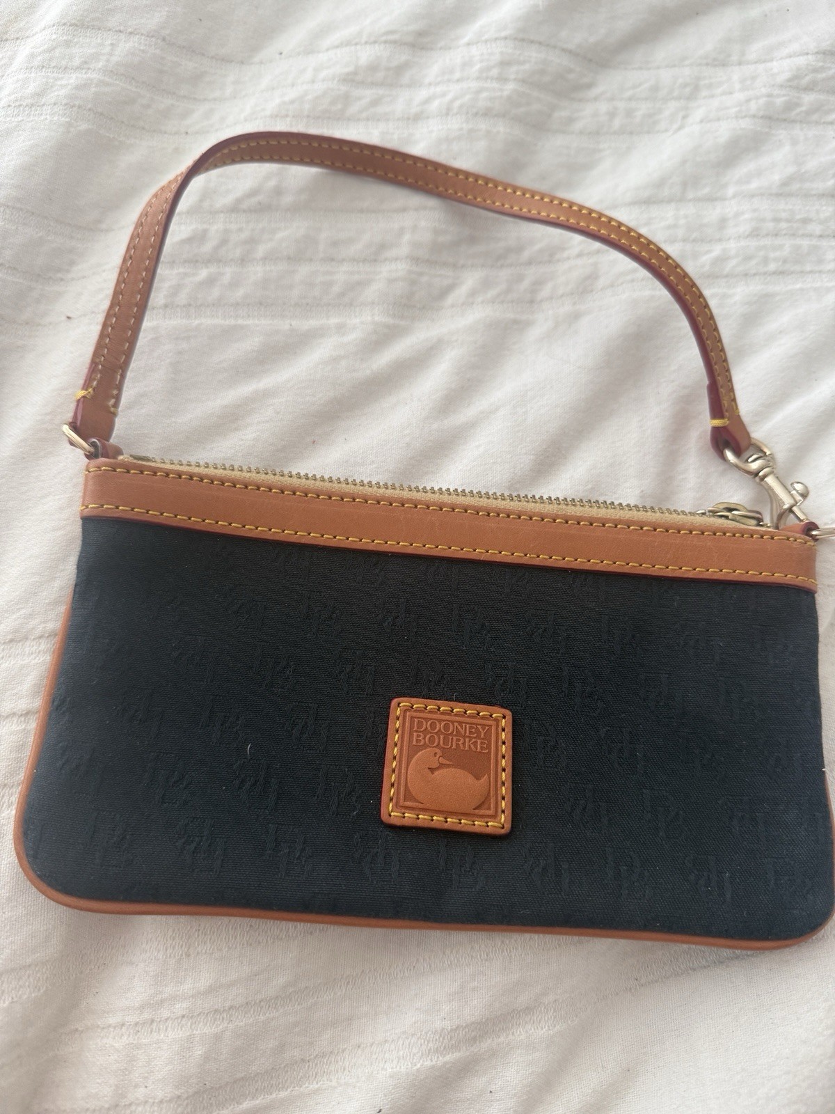 Dooney and Bourke Navy Signature Canvas Wristlet With Leather Accents