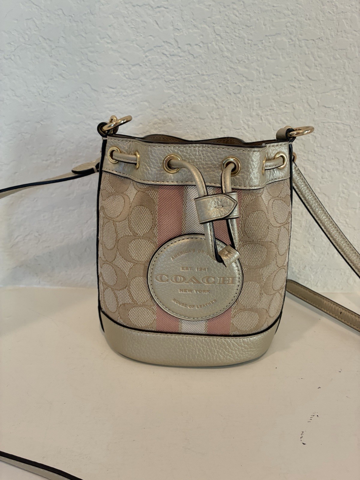 COACH C8322 Dempsey Mini Bucket Bag Signature Canvas Stripe Pink Multi Crossbody