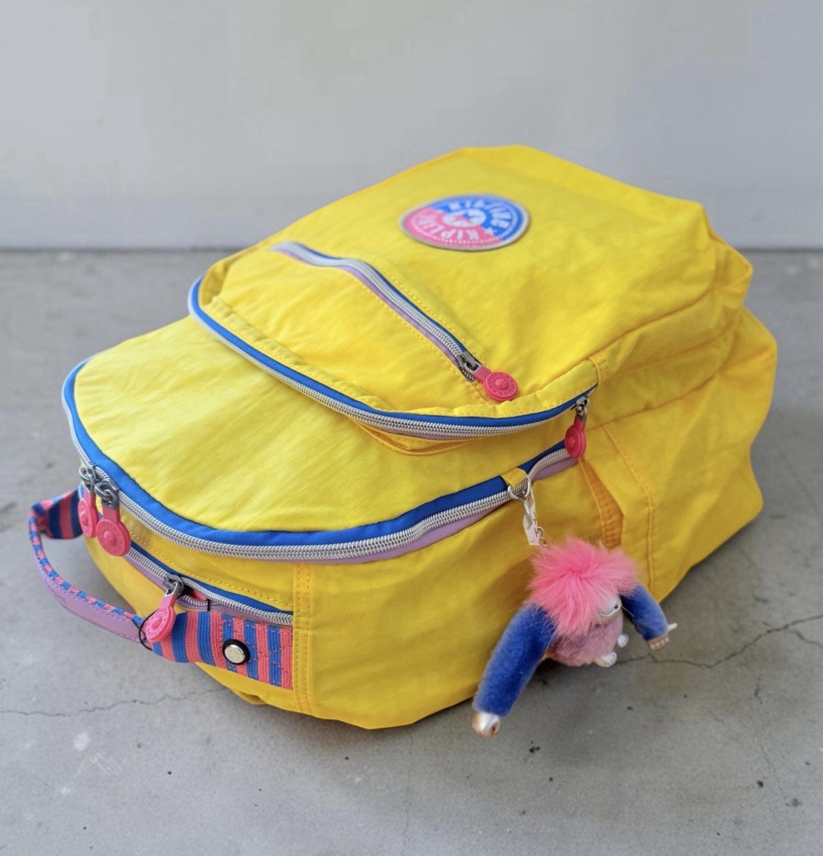 Kipling Seoul Large 15″ Laptop Backpack & 100 Pens Case Yellow Party