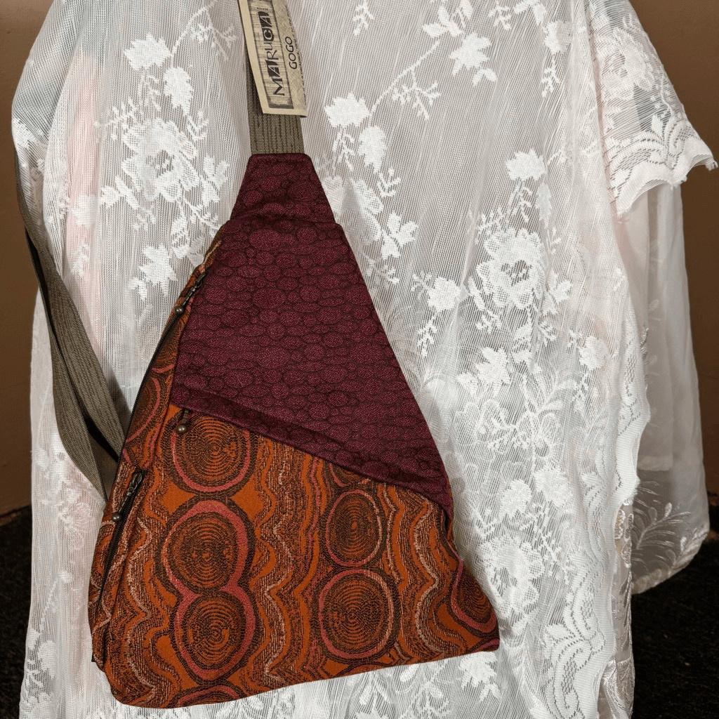 Maruca Gogo” Sling Bag Burnt Orange Spiral & Burgundy Mixed Print | NWT