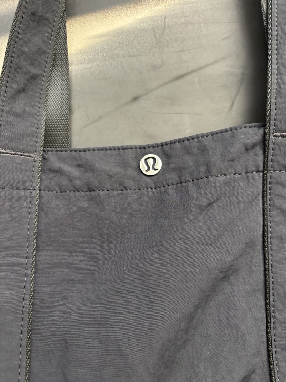 lululemon Black Solid Tote Bag Snap Closure Inner Pockets Silver Hardware