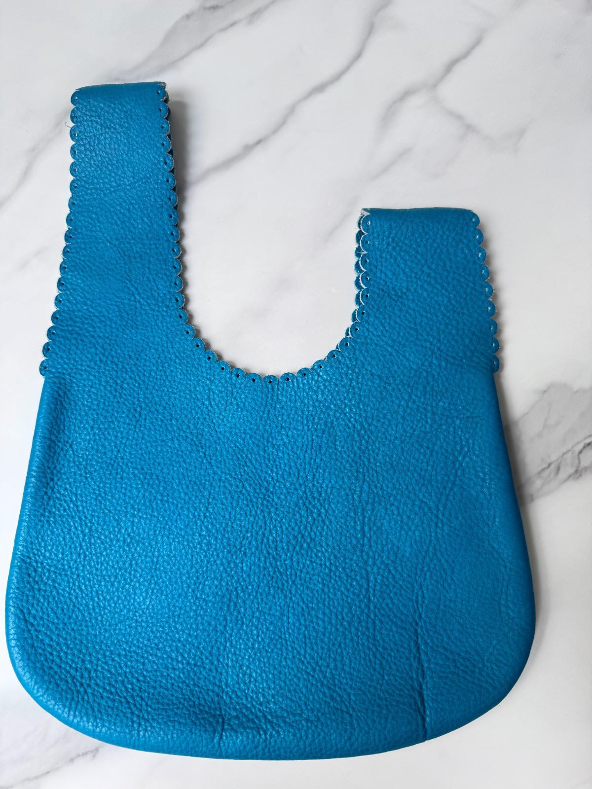 Pre-Owned RUBYZAAR Blue Pebbled Perforated Lace Leather Teardrop Wristlet Bag